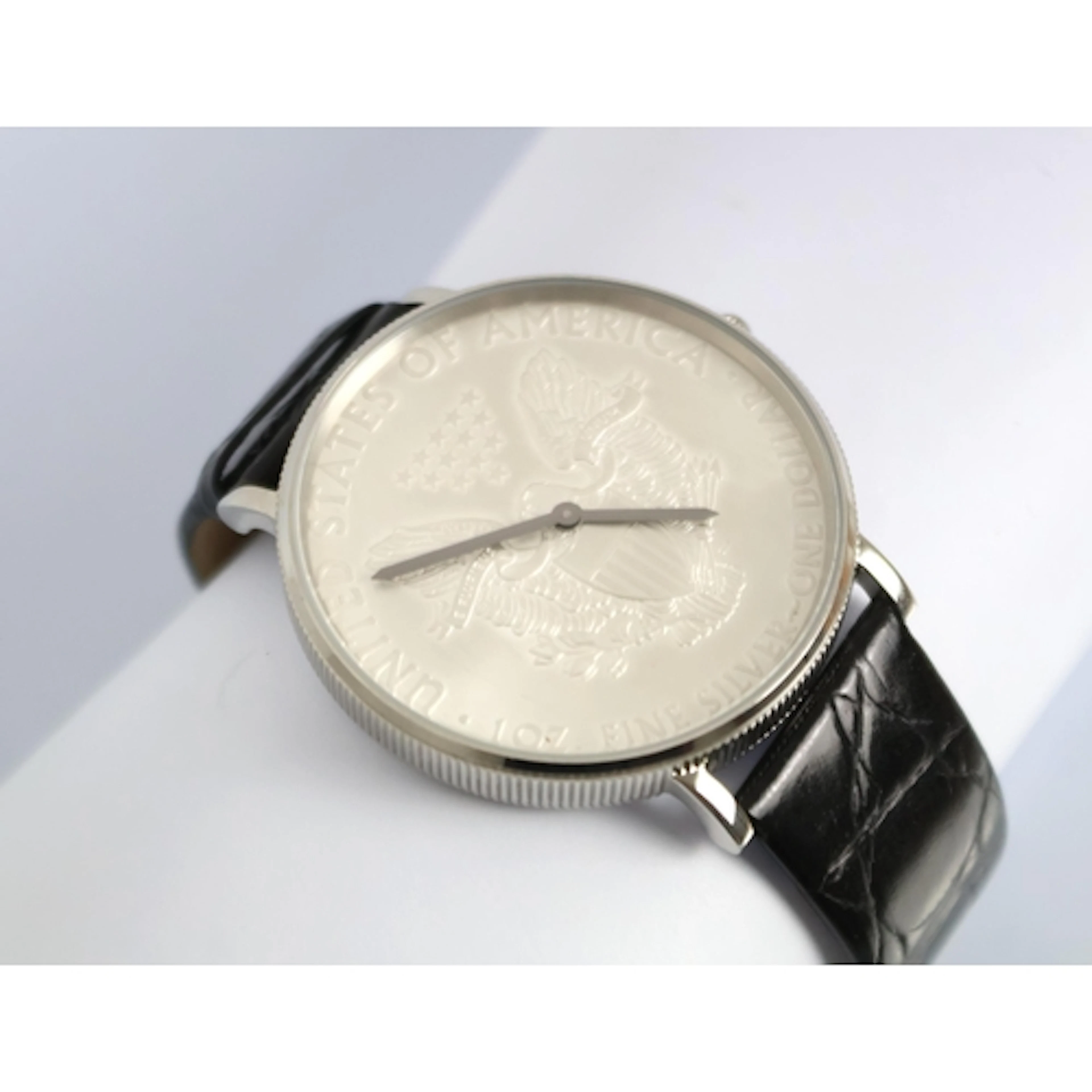A Croton US Silver Dollar wristwatch, dated 2008, the large ...