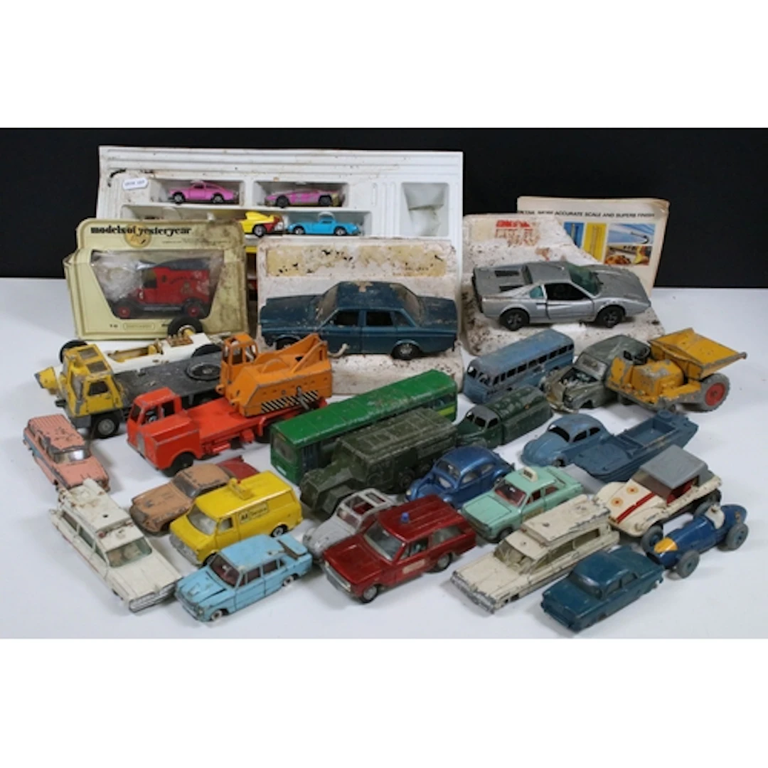 Collection of playworn diecast models to include Dinky, Tria...