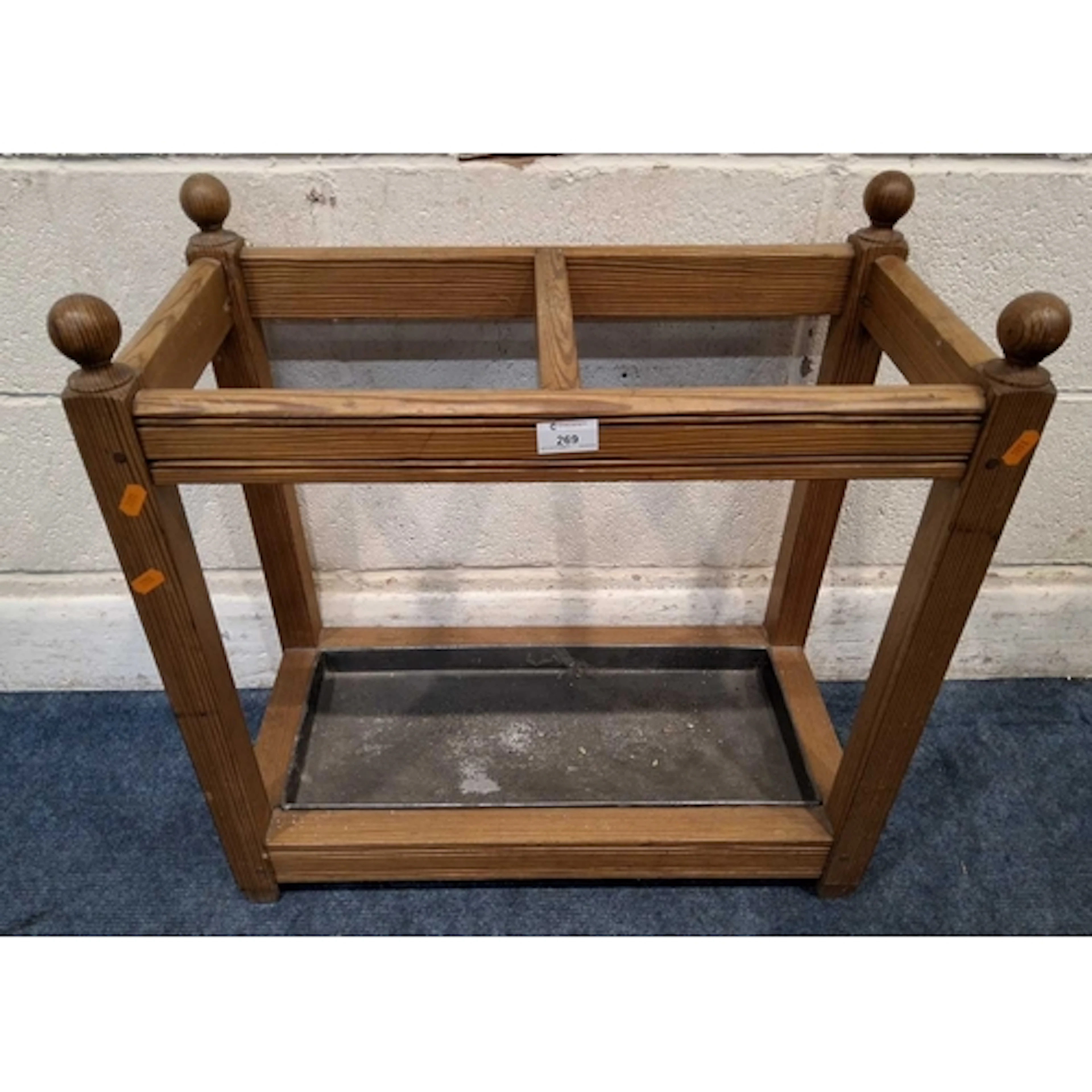 A MODERN PINE UMBRELLA / STICK STAND, with four finnials, tw...