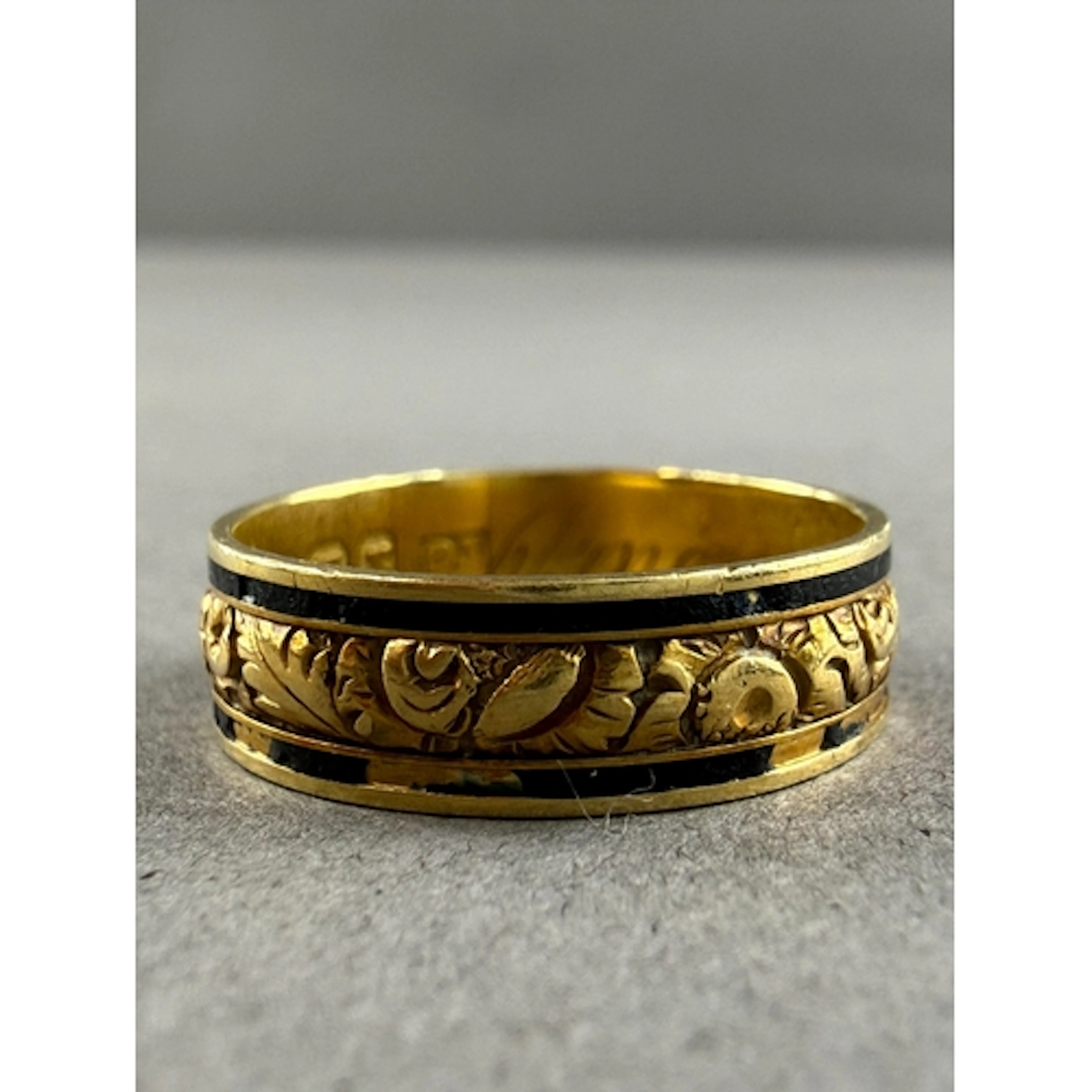 Jewellery: an 18ct yellow gold mourning ring, London 1824, a...