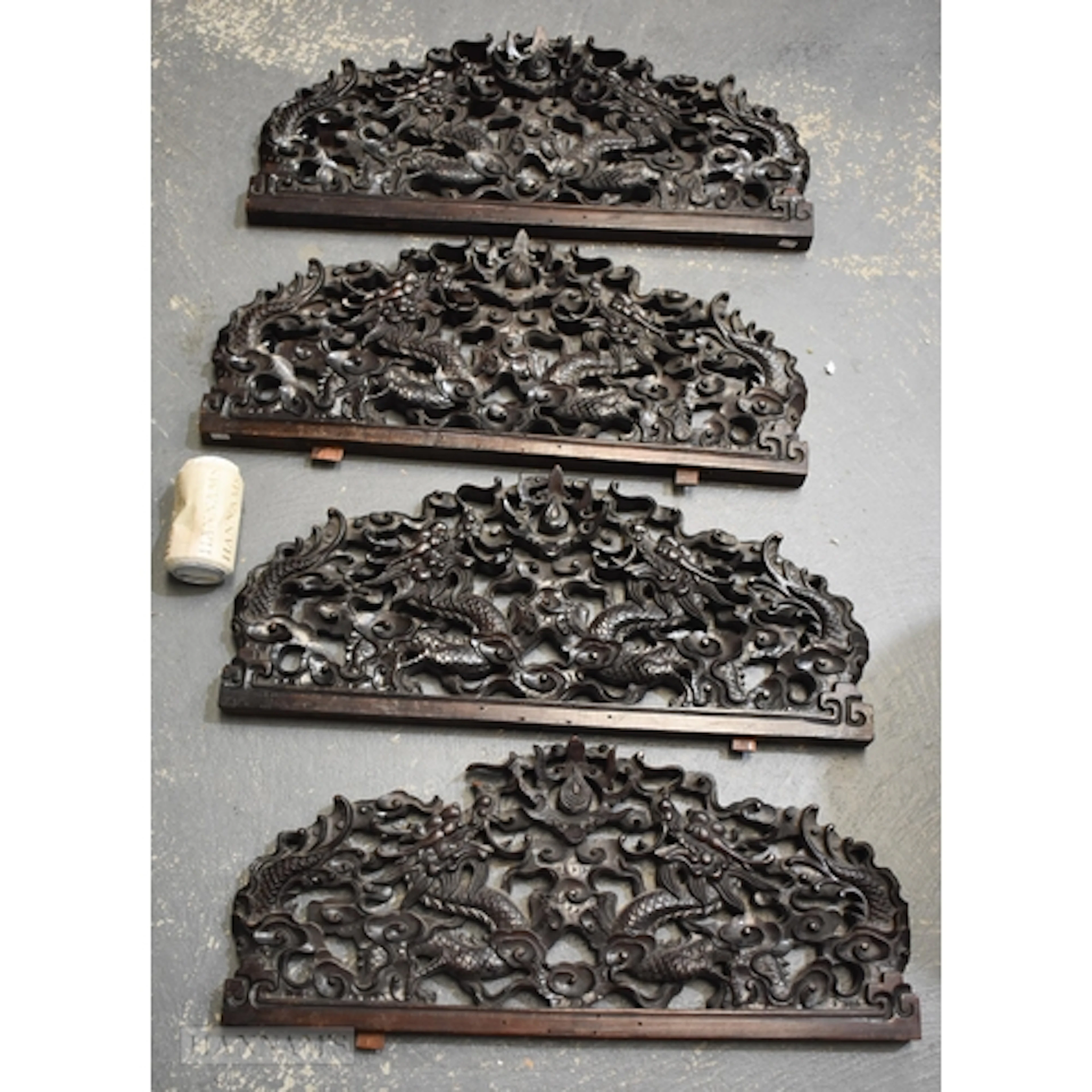 A SET OF FOUR 19TH CENTURY CHINESE CARVED HARDWOOD DRAGON PA...