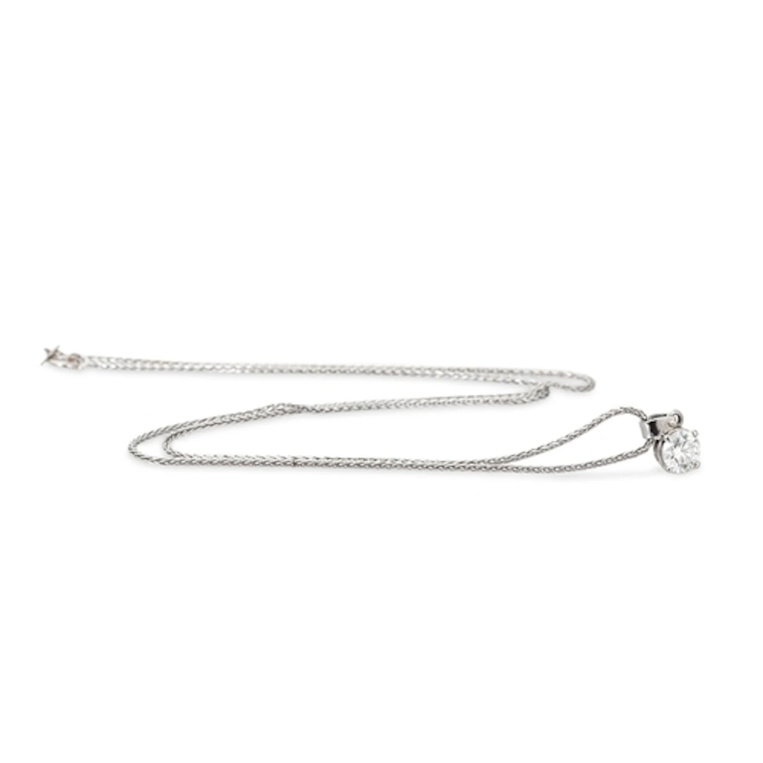 A DIAMOND PENDANT, to a platinum mount and 18ct gold chain. ...