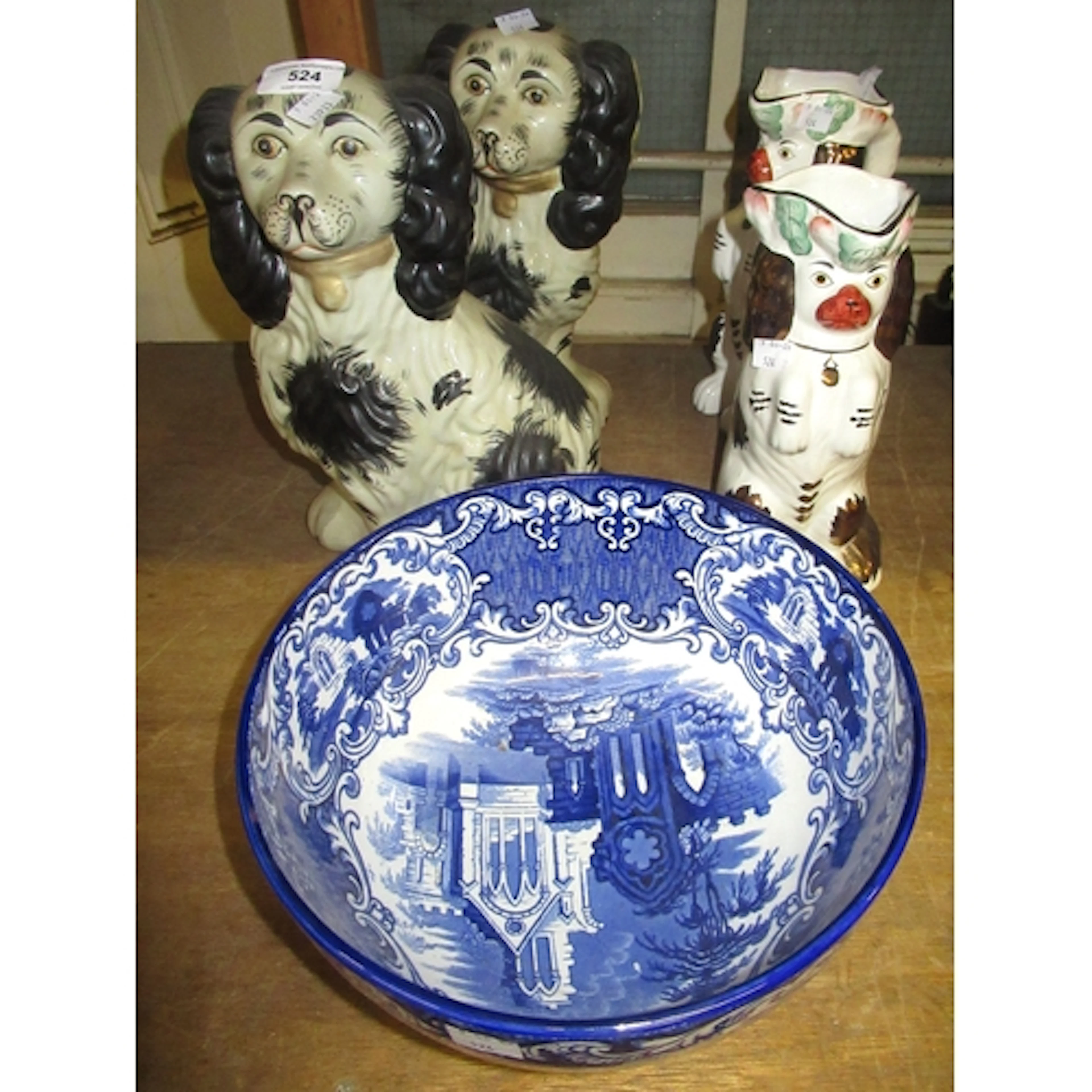 Pair of large Staffordshire pottery figures of seated King C...