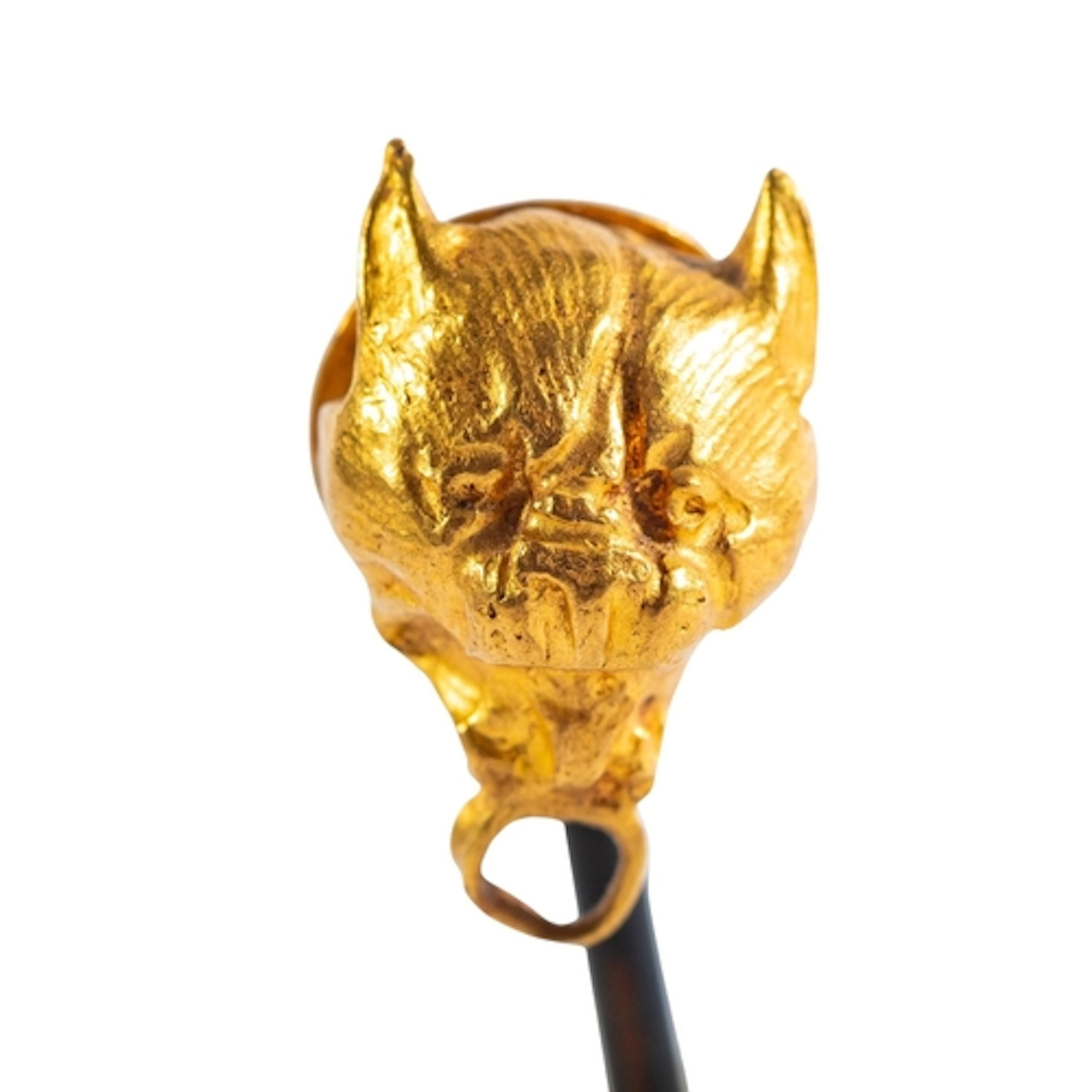A GREEK YELLOW METAL LYNX HEAD TERMINAL, CIRCA 4TH-3RD CENT...