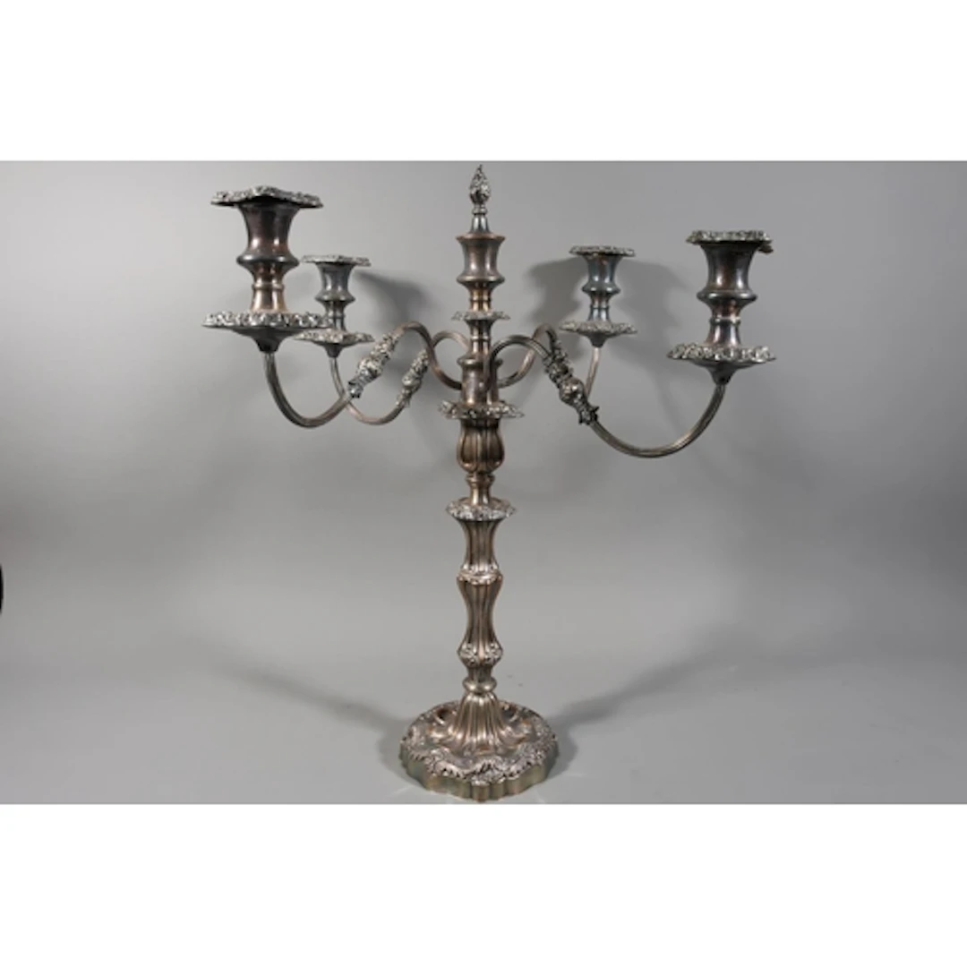 Silver plated copper four-branch candelabra, 55cm tall.