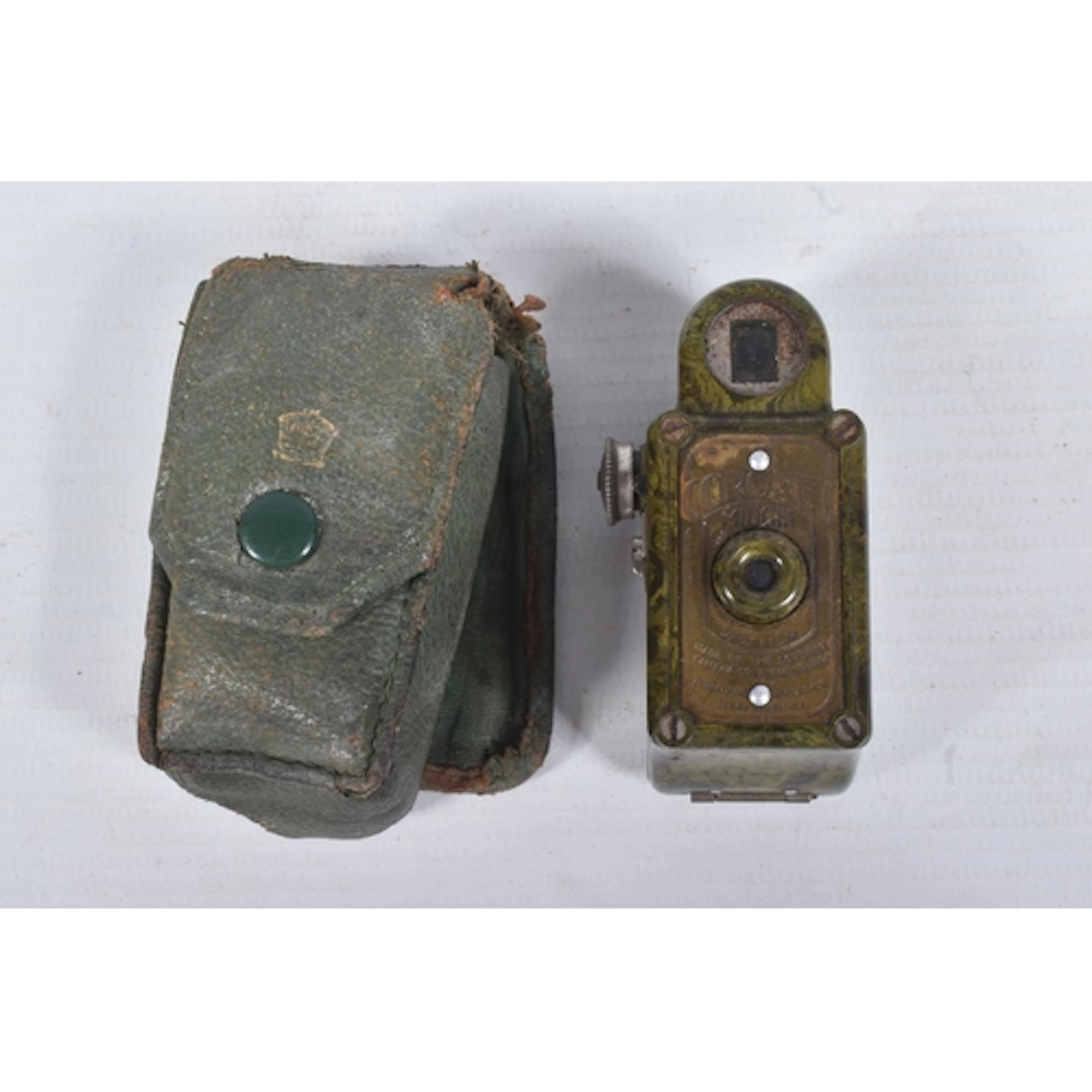 A CORONET MIDGET BAKELITE CAMERA, green marbled appearance, ...