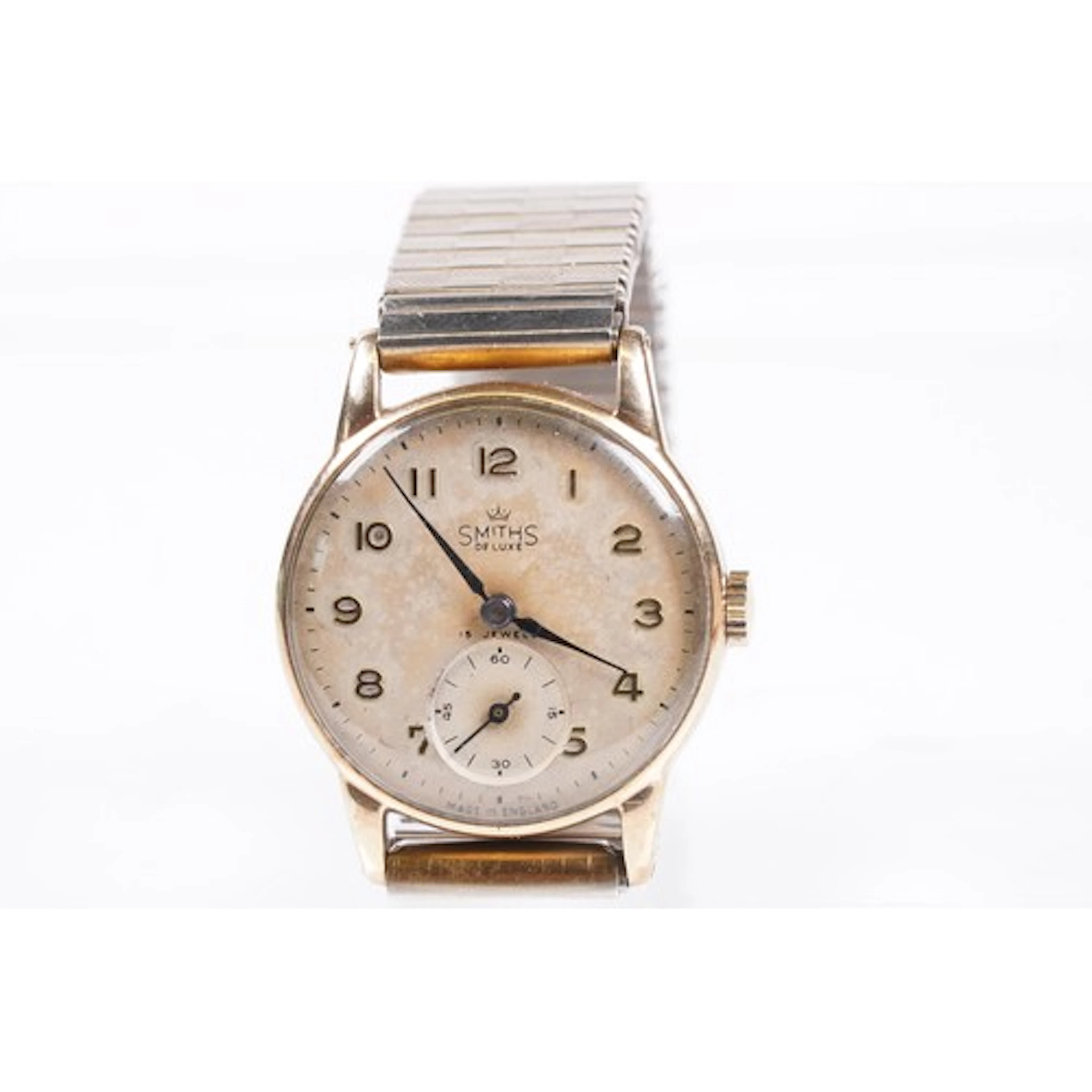 9ct Smiths De Luxe gentleman's wrist watch. The watch having...