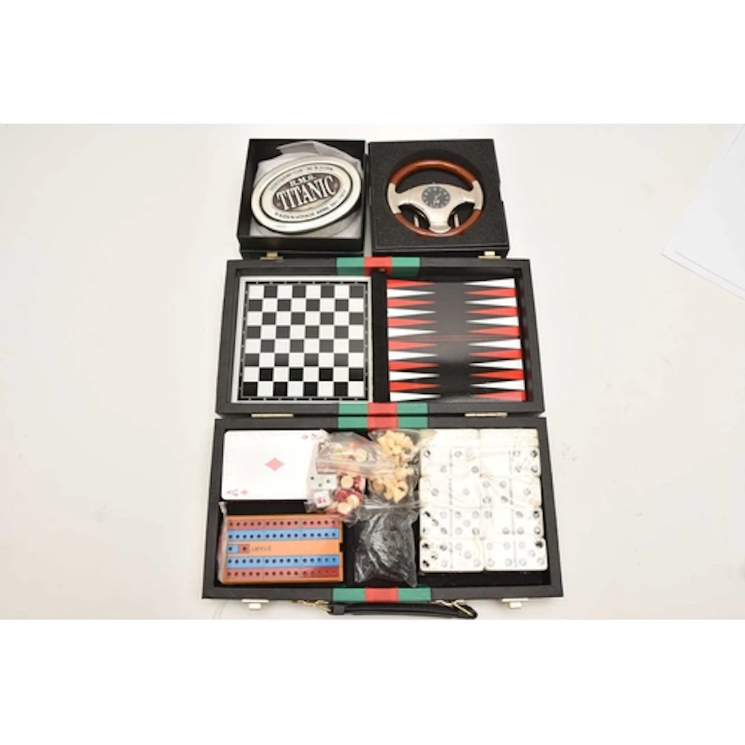 A 6 IN 1 GAMES COMPENDIUM AND TWO OTHER ITEMS, the case cont...