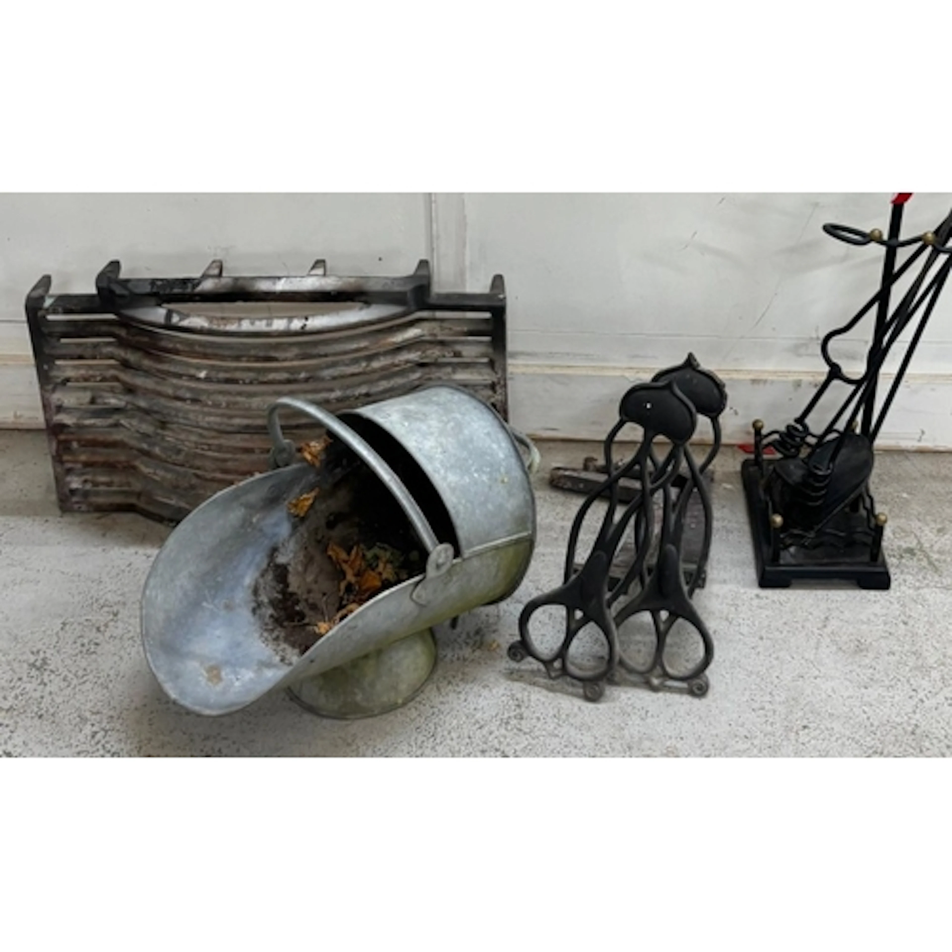 A selection fire place items including tools and grate...