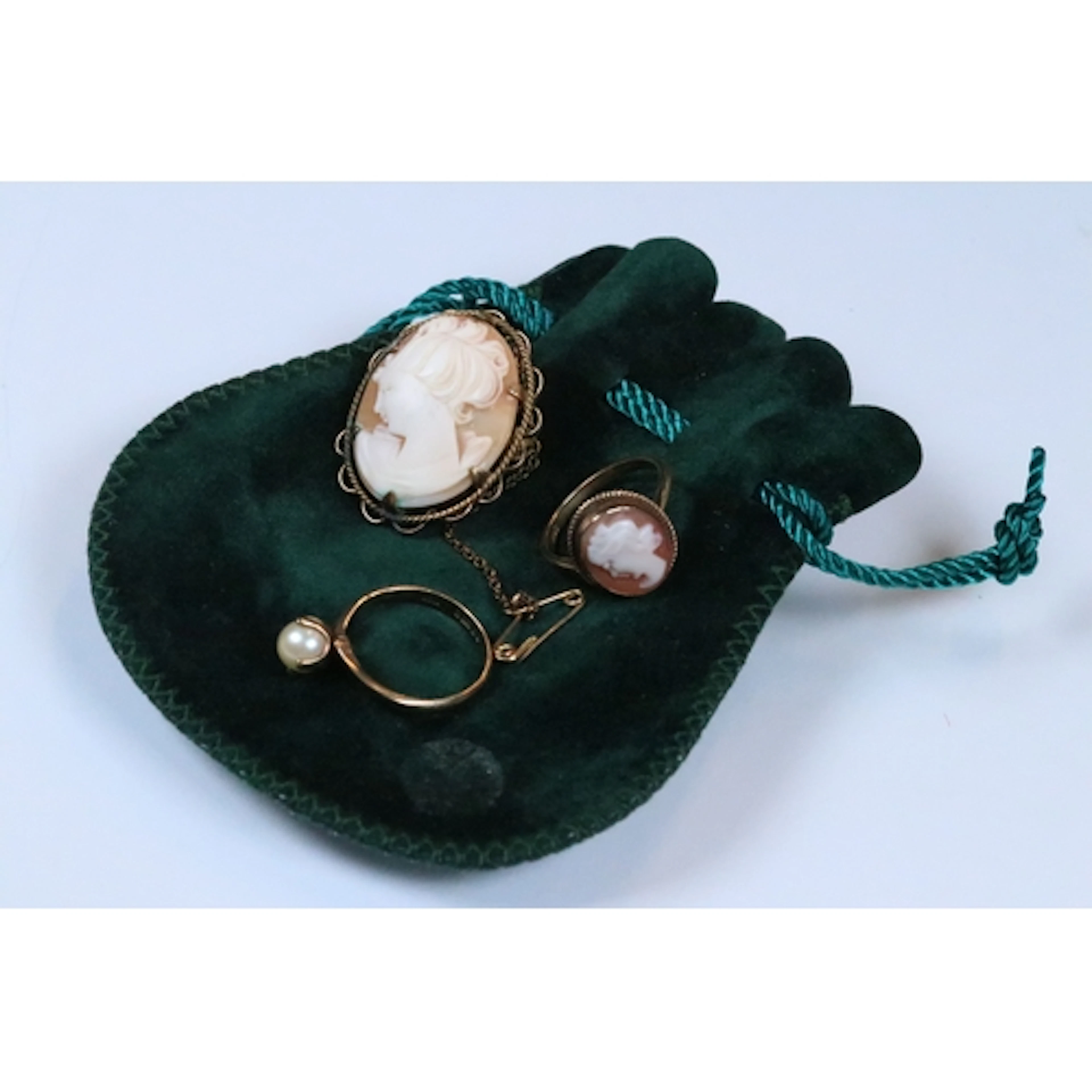 Two 9ct gold rings together with a rolled gold cameo brooch....
