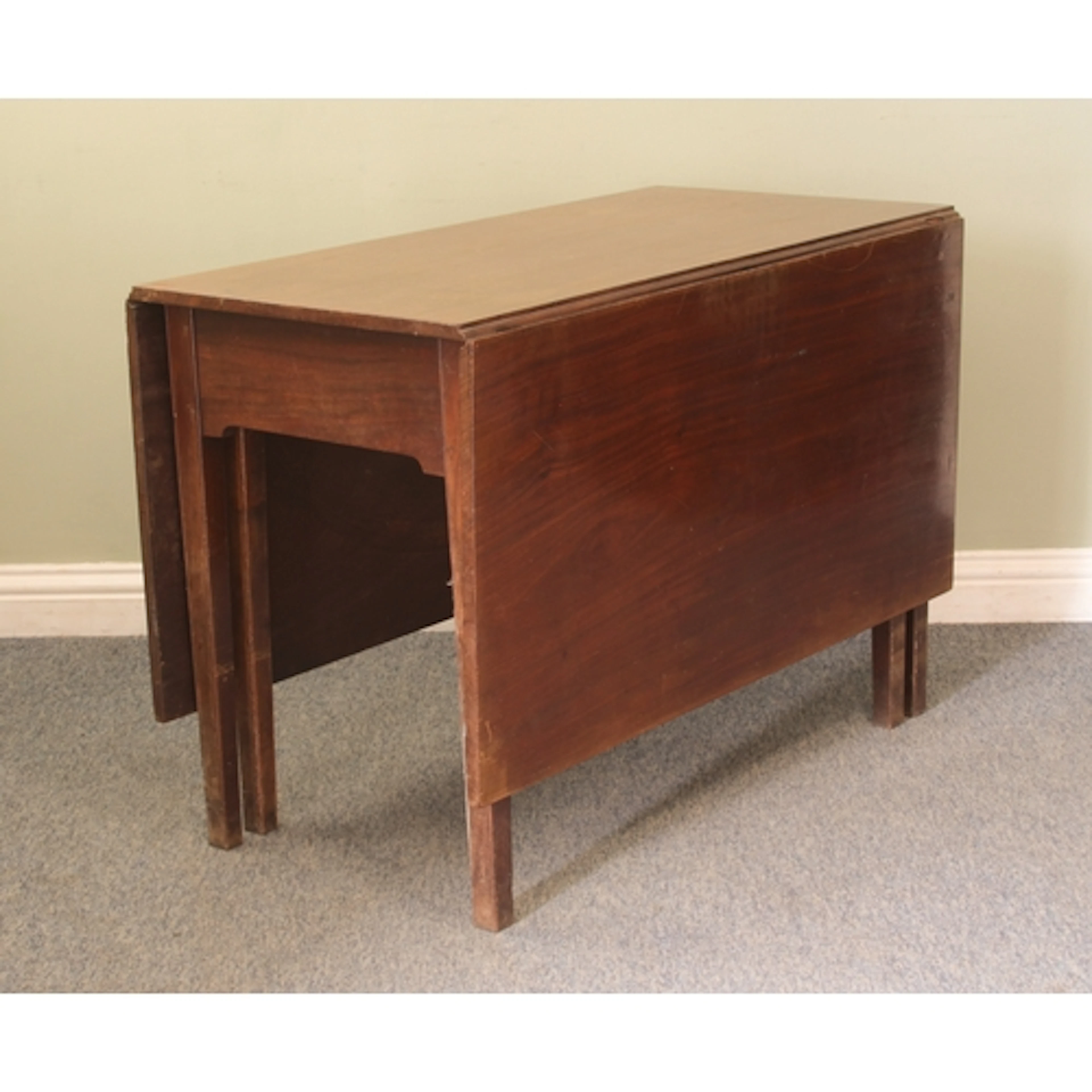 An early 19th century mahogany gateleg drop-flap table - the...