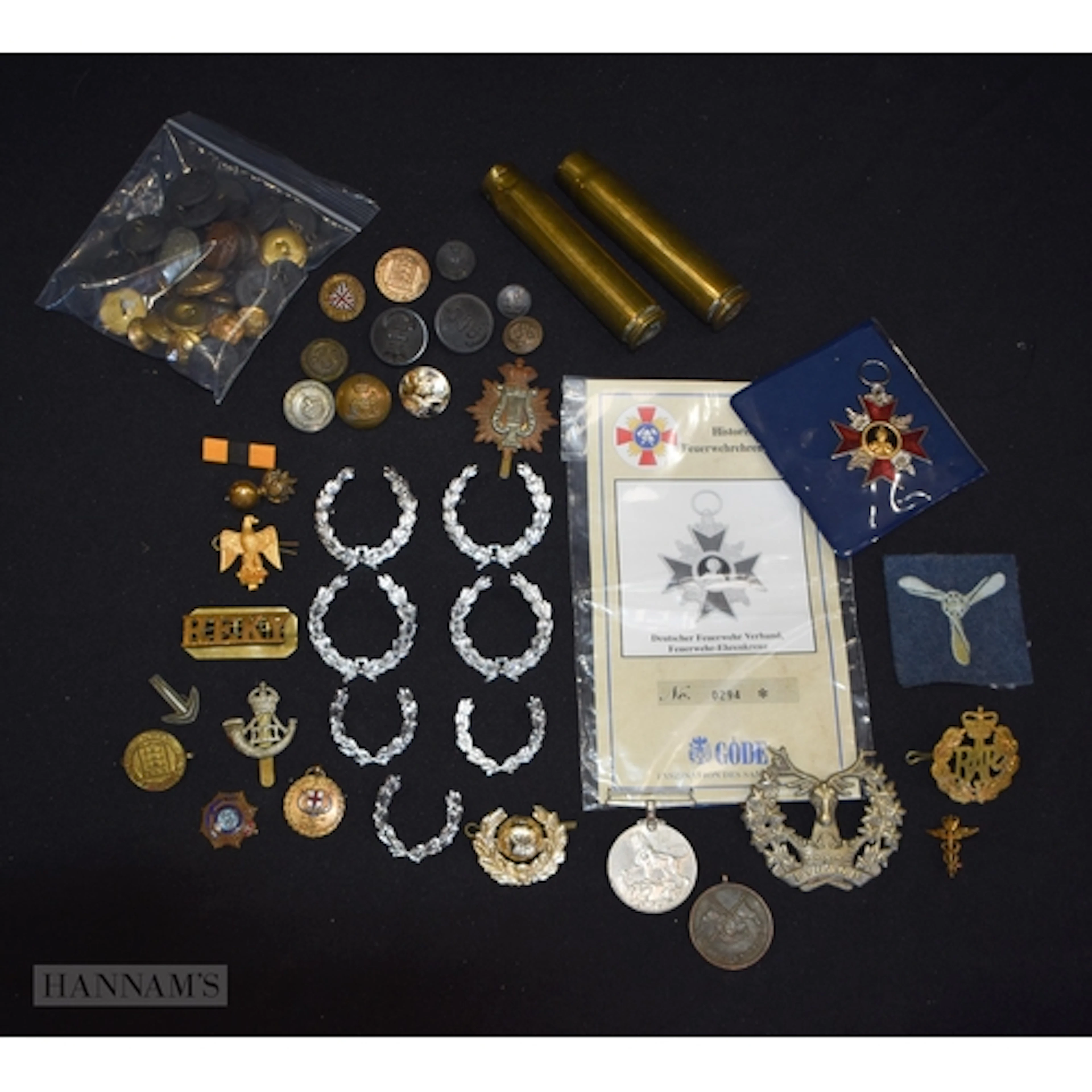 A collection of military badges, buttons medals etc (Qty)