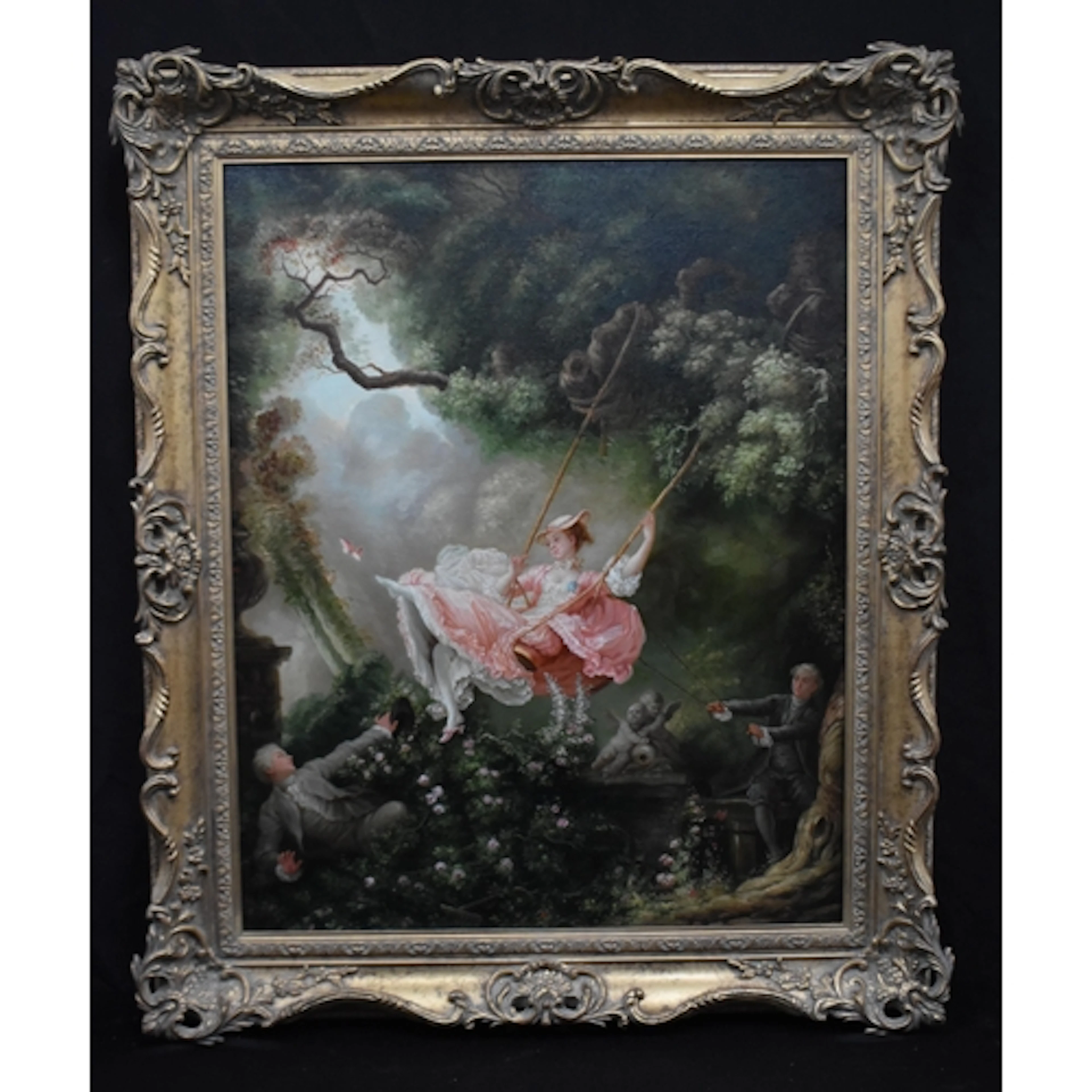 A large framed oleograph on canvas " The Swing" by Fragonar...