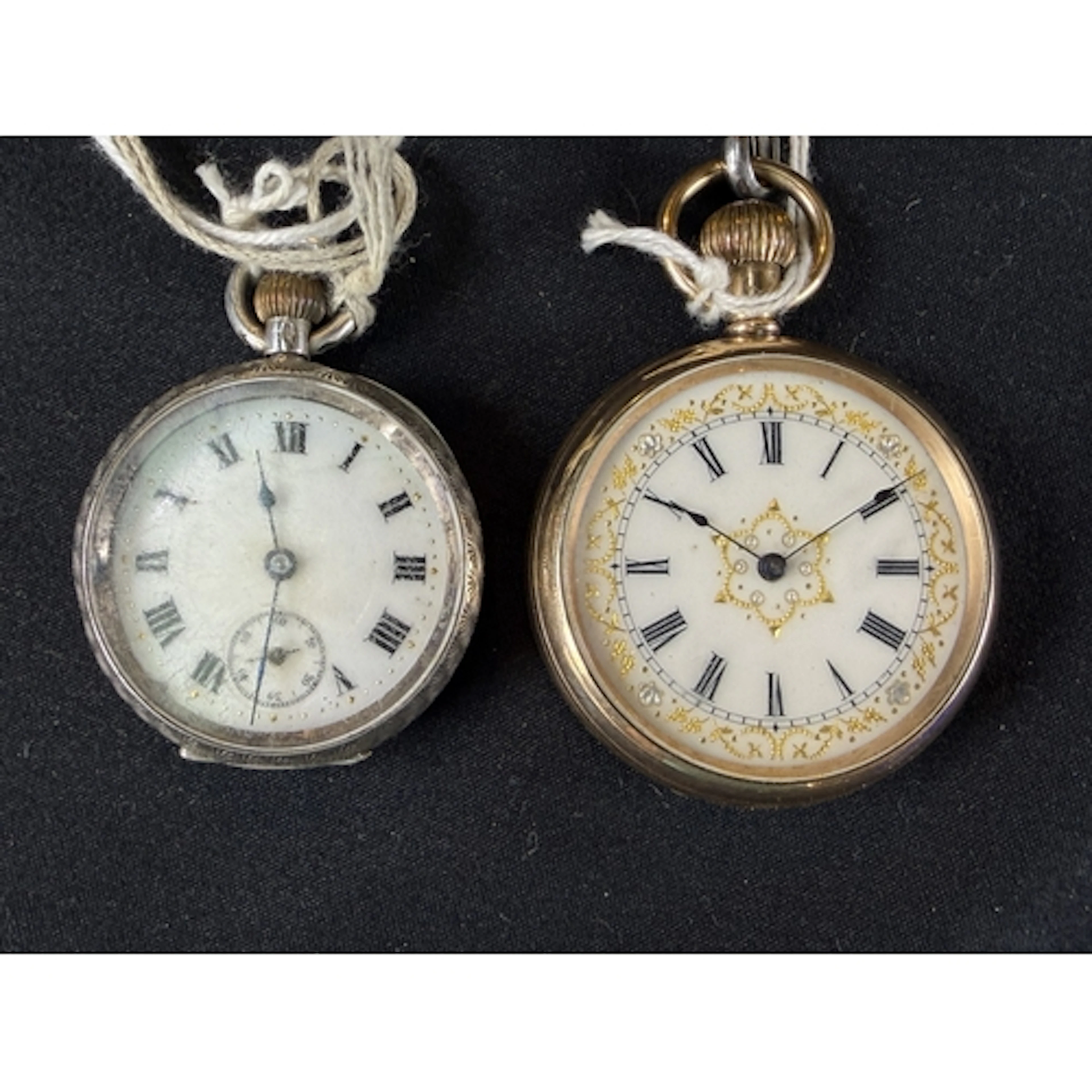 A lady's gold plated open faced key wound pocket / fob watch...