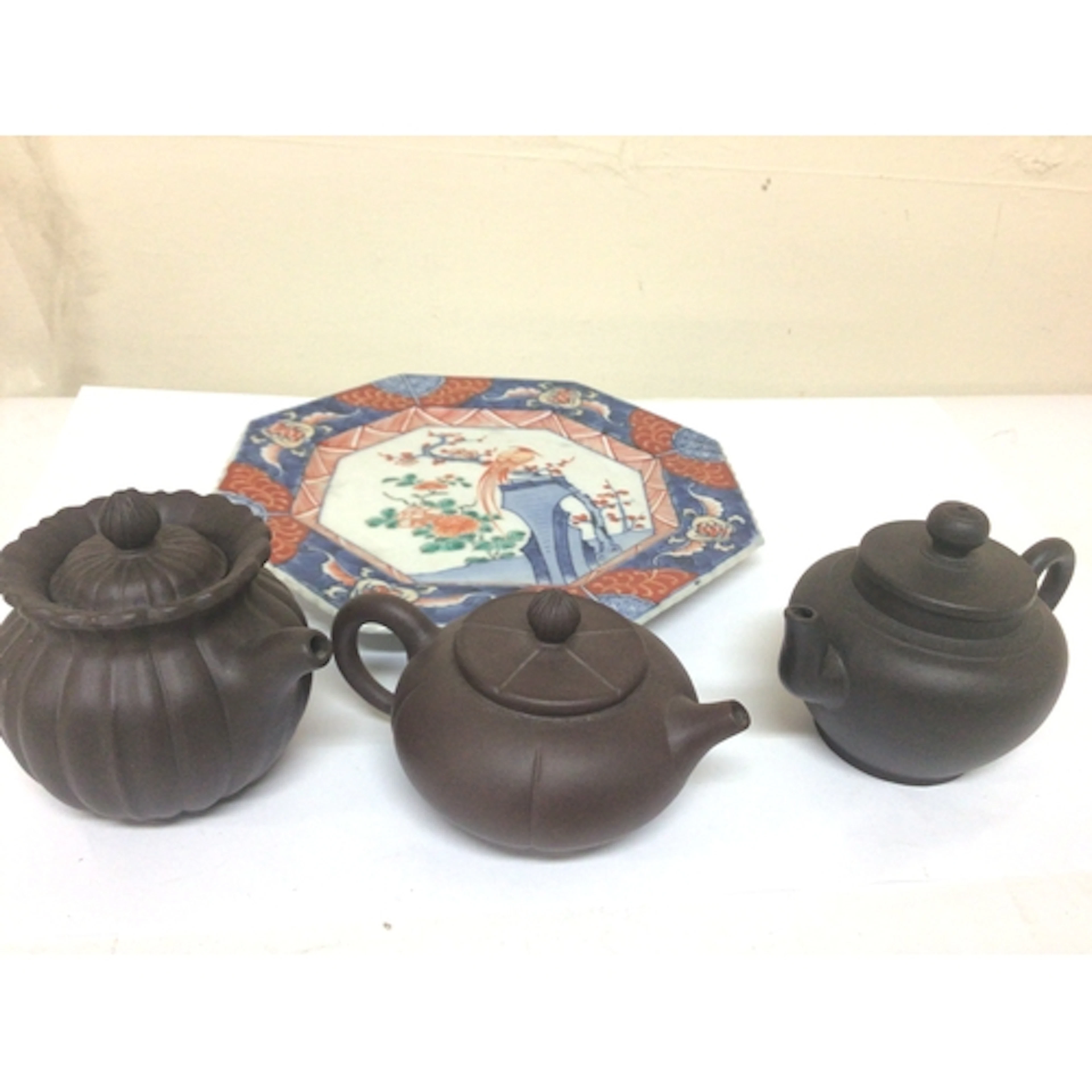 Three Chinese miniature terracotta dark brown teapots ...
