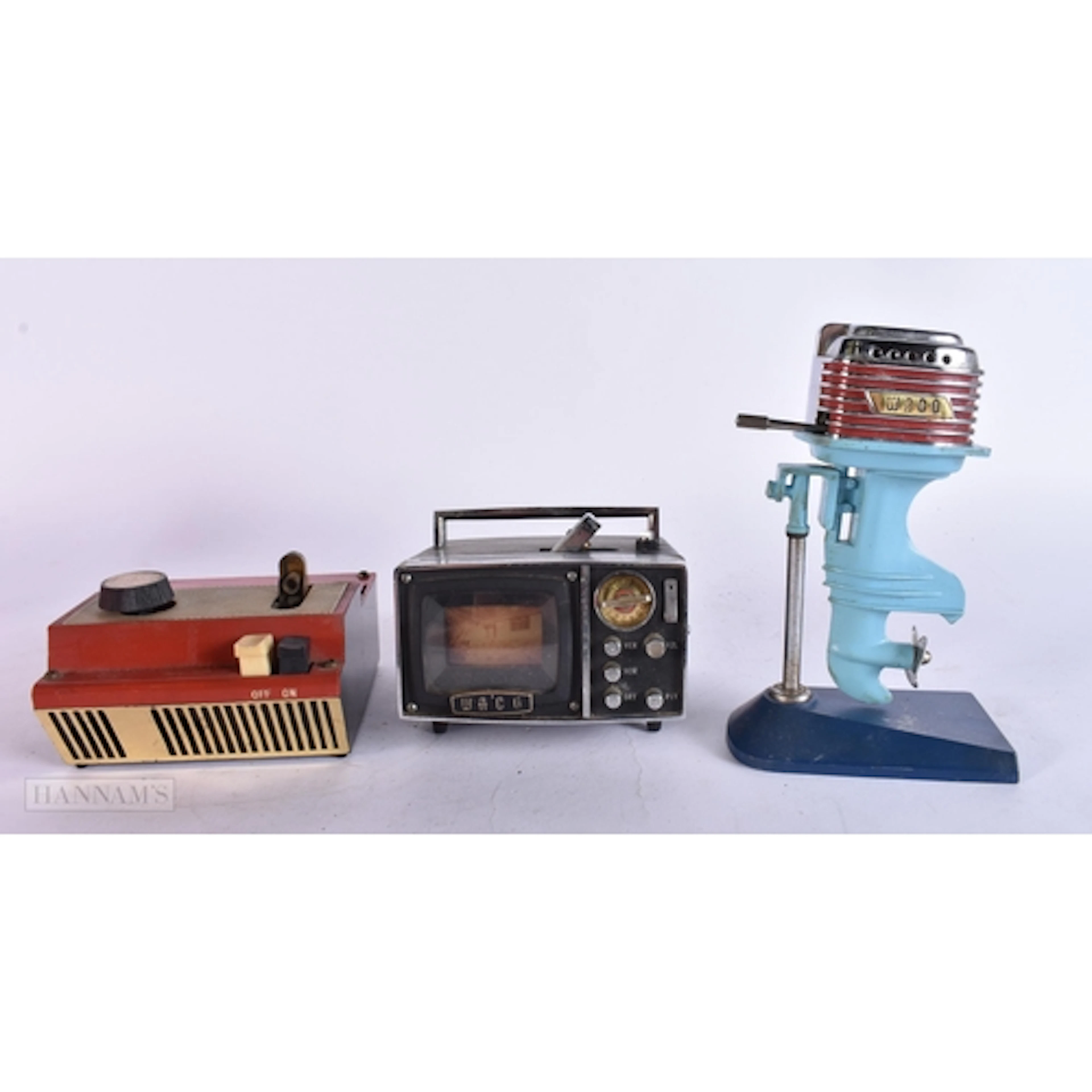 TWO VINTAGE NOVELTY WAGO LIGHTERS together with another. (3)