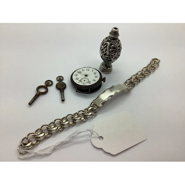 A Hallmarked Silver ID Bracelet, the vacant rectangular pane...