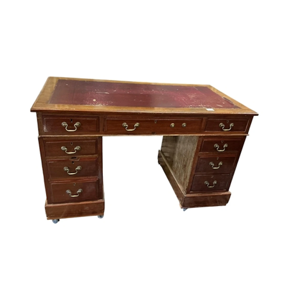 An early 20th century mahogany pedestal desk, the top inset ...