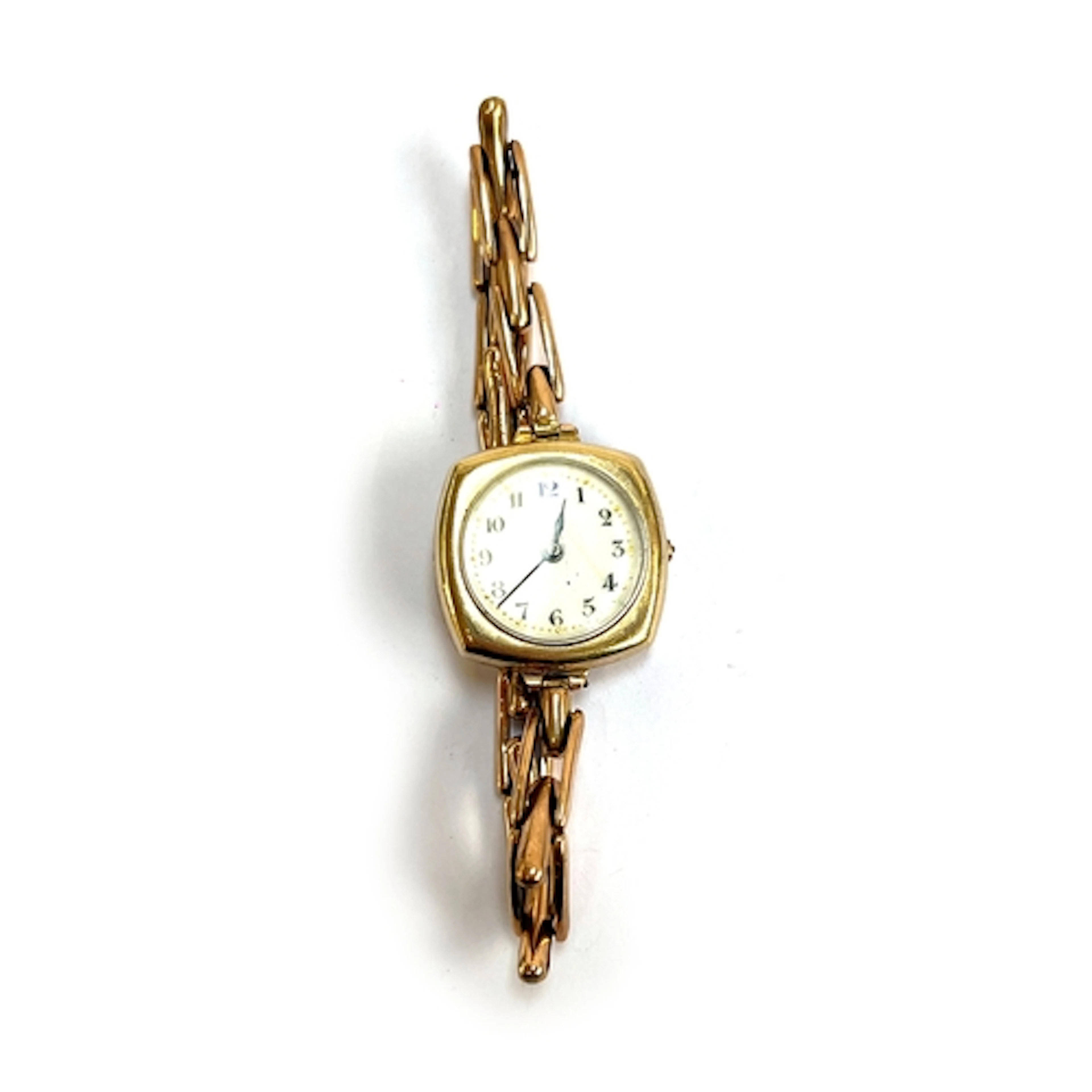 A gold Art Deco watch with enamel dial, the case with engrav...