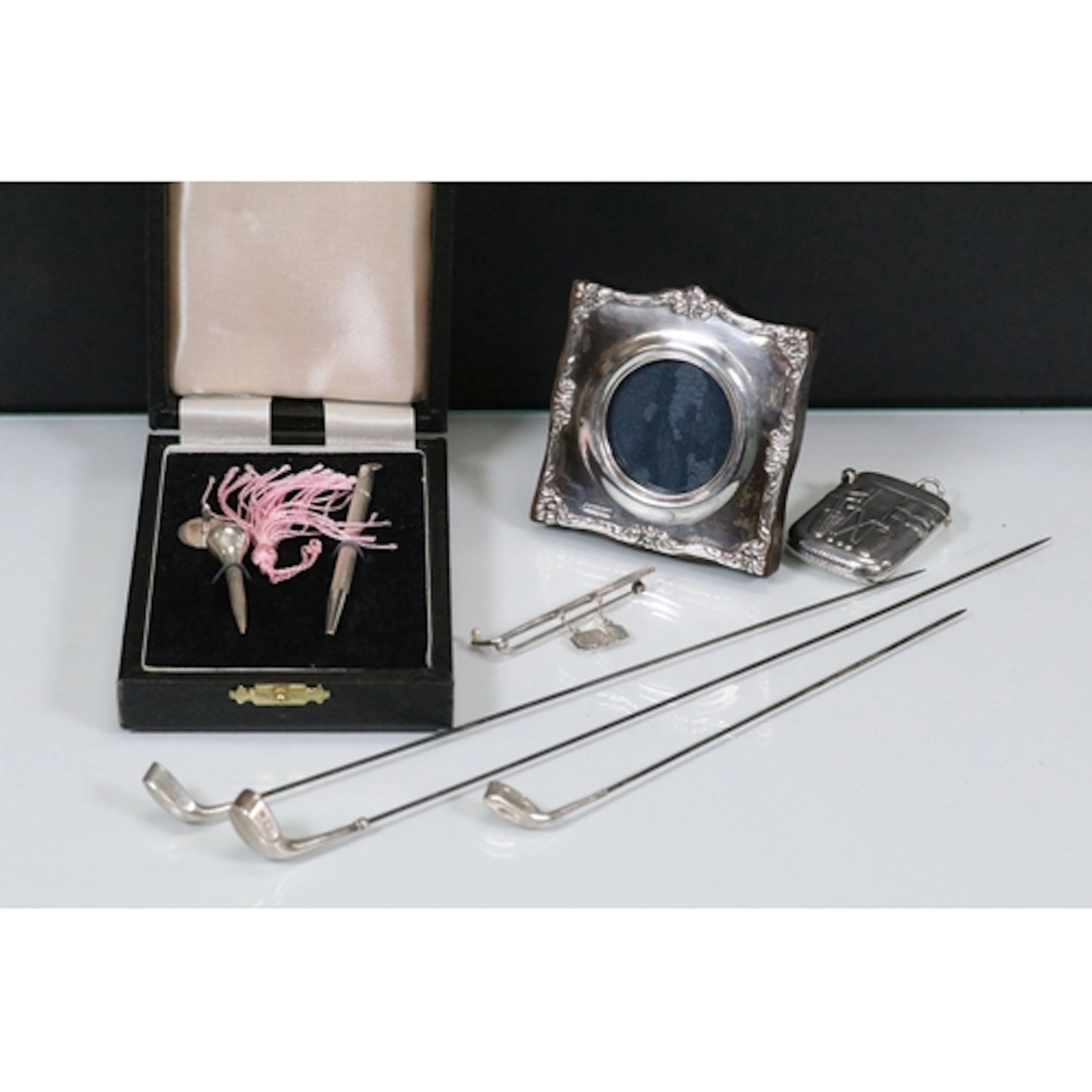 Group of 20th Century silver and white metal golfing related...