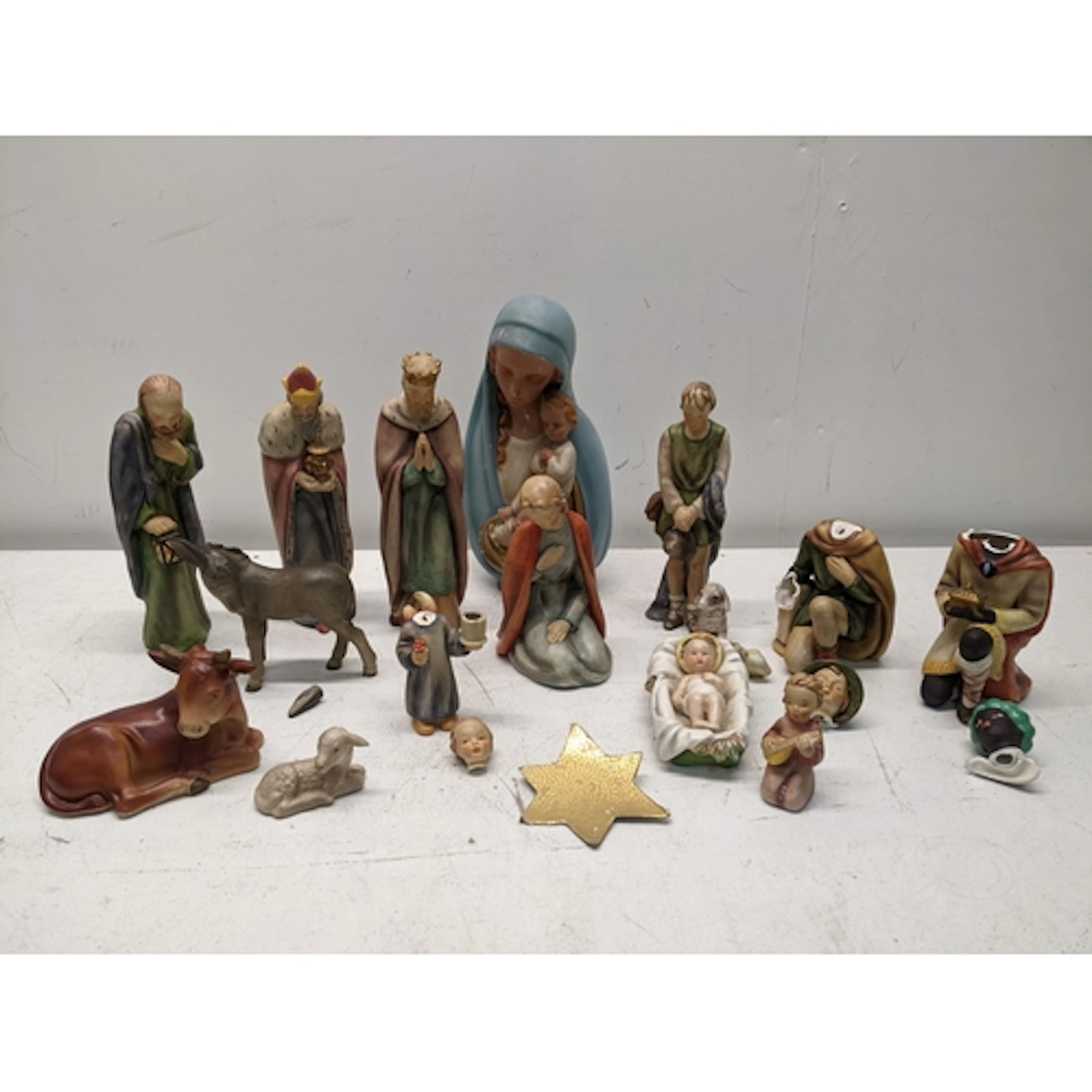 A Goebel porcelain nativity part set comprising the Infant J...