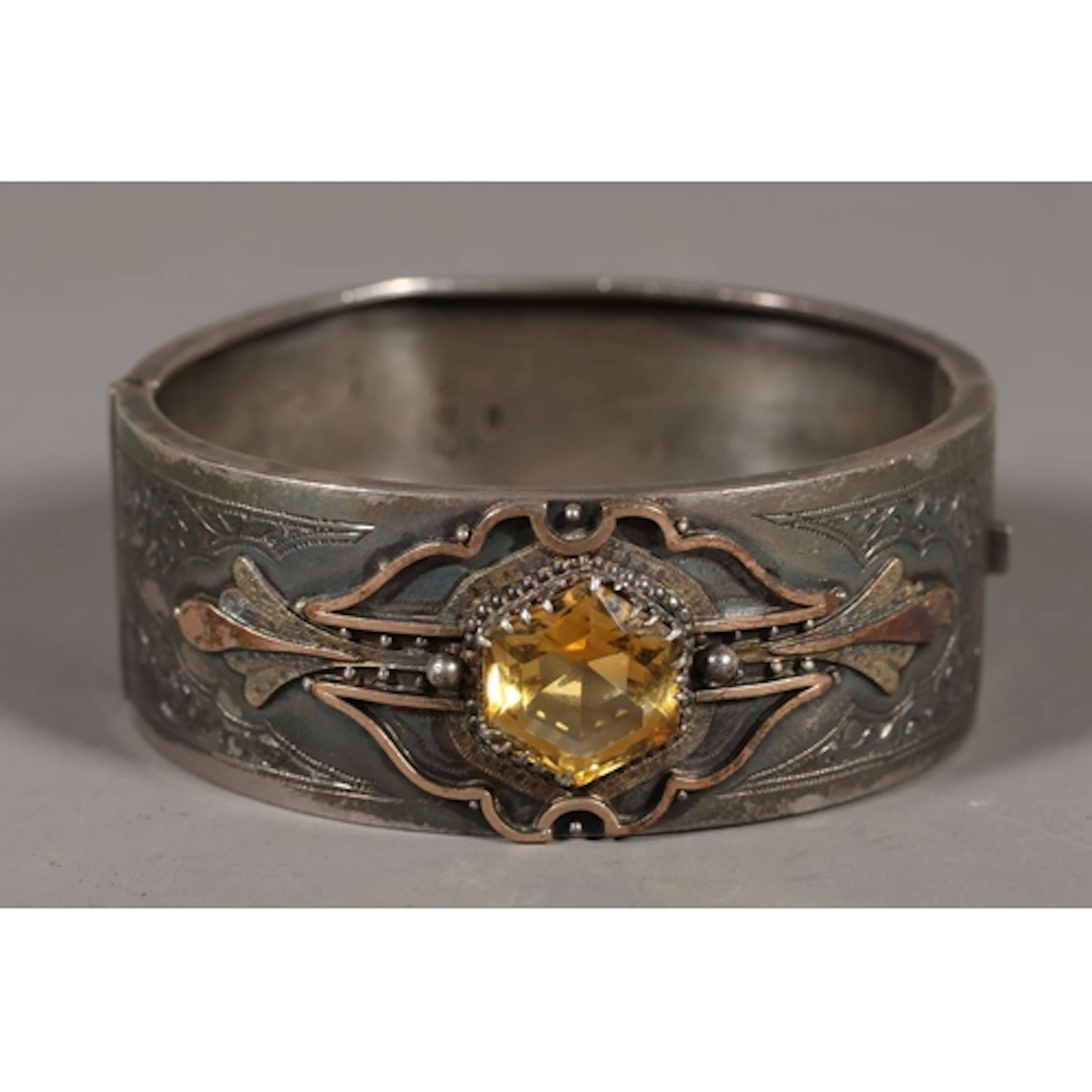 Victorian silver bangle set with faceted Cairngorm citrine, ...