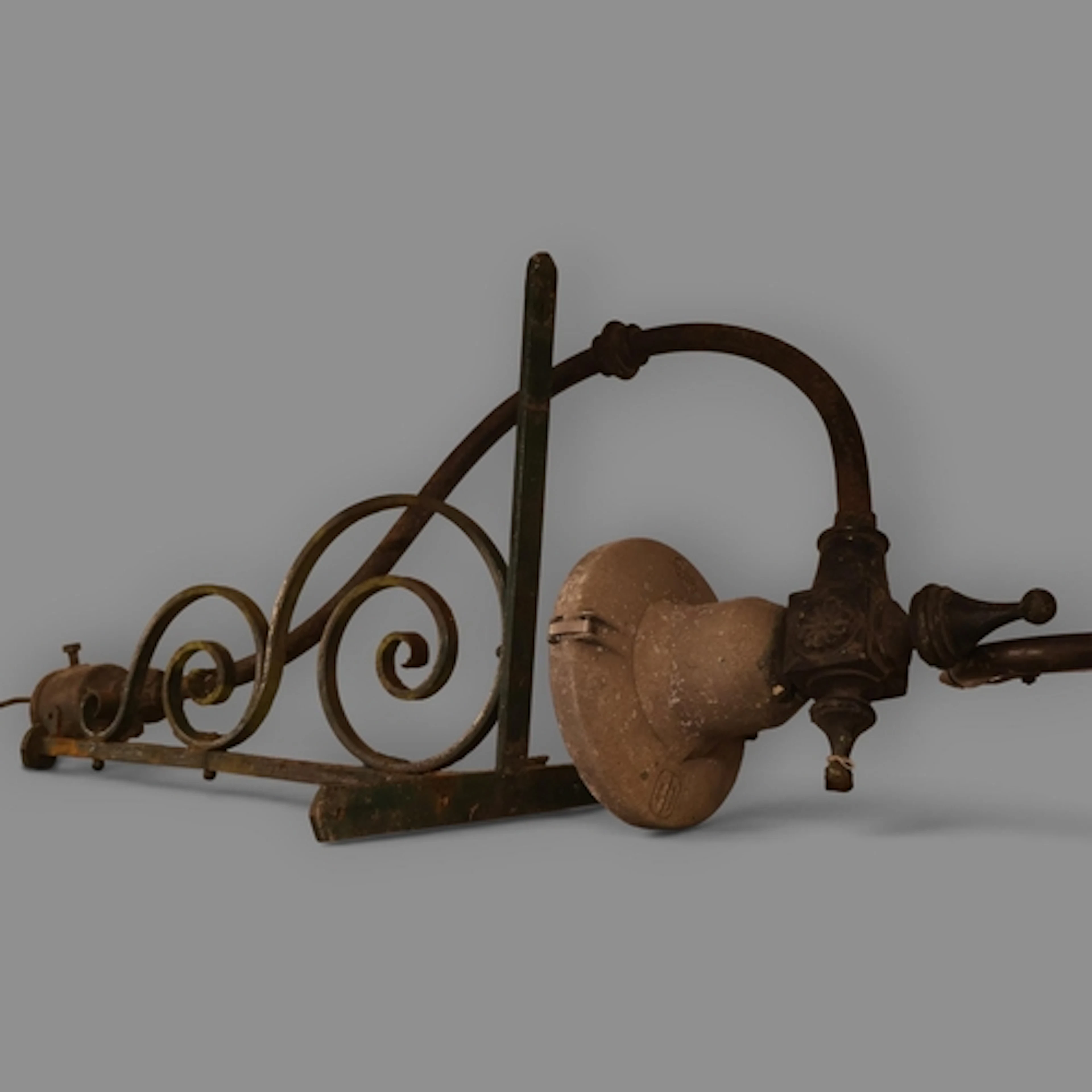 A vintage cast iron street lamp, labelled Eleco. H110cm, and...