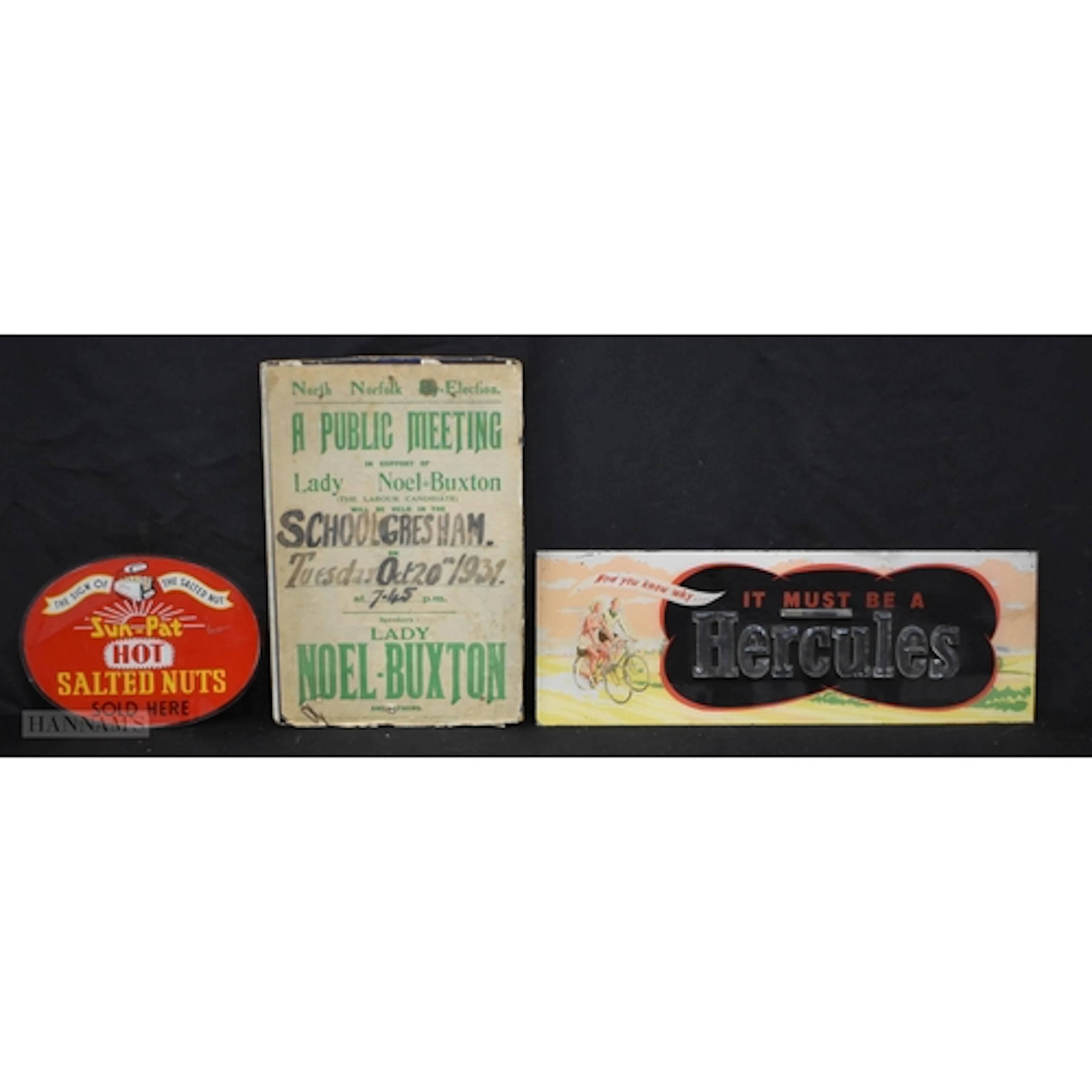 A vintage plastic Hercules retail sign together with a Sun p...