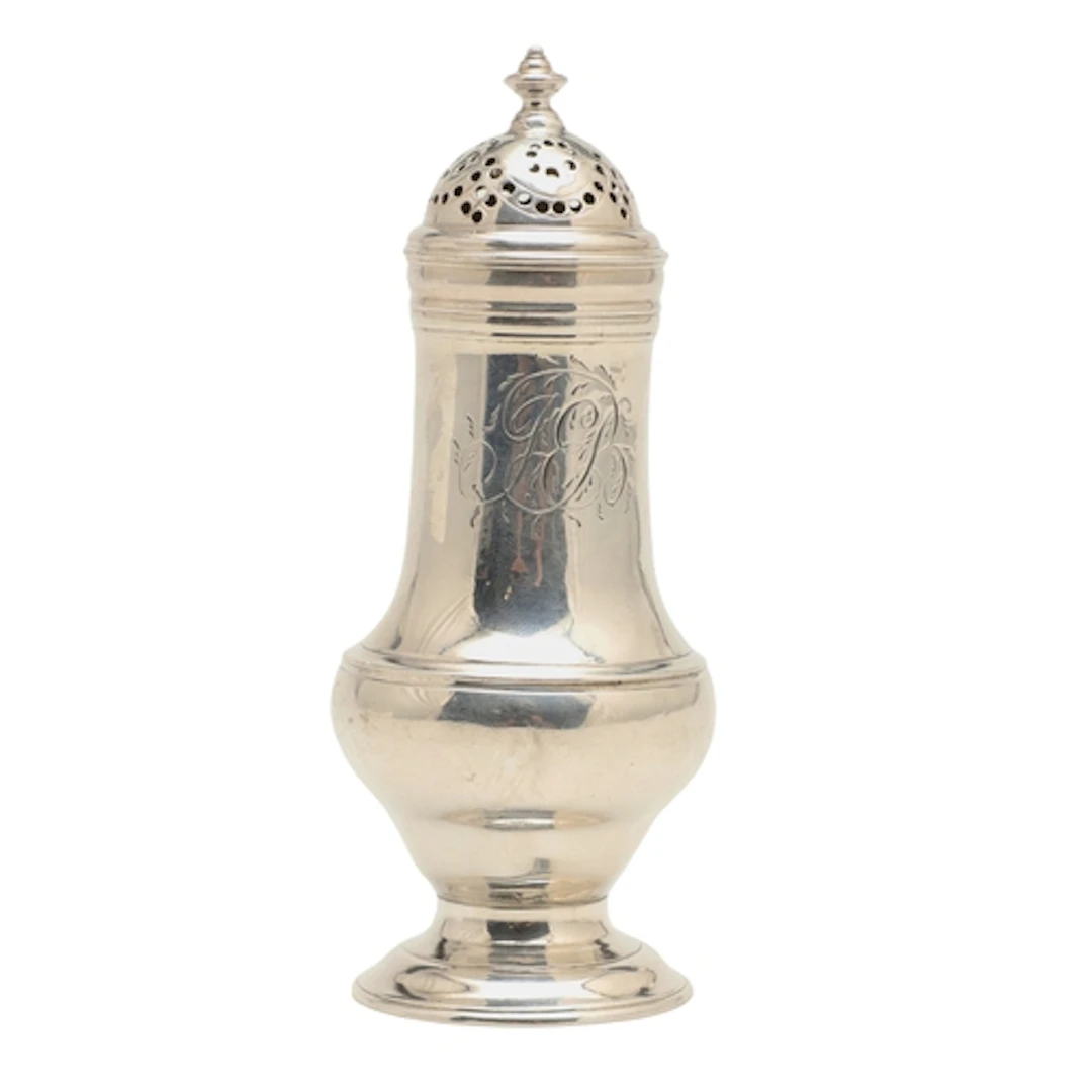 A GEORGE II SILVER PEPPER CASTER. Of baluster form, engraved...