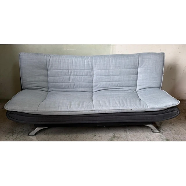 A Michigan two seater charcoal and grey sofa bed on chrome e...
