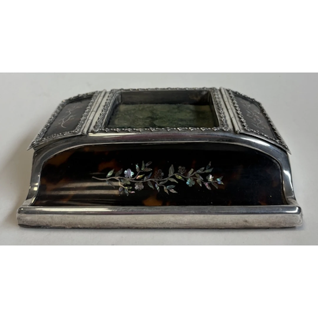 A novelty silver and faux tortoiseshell combination stamp ho...