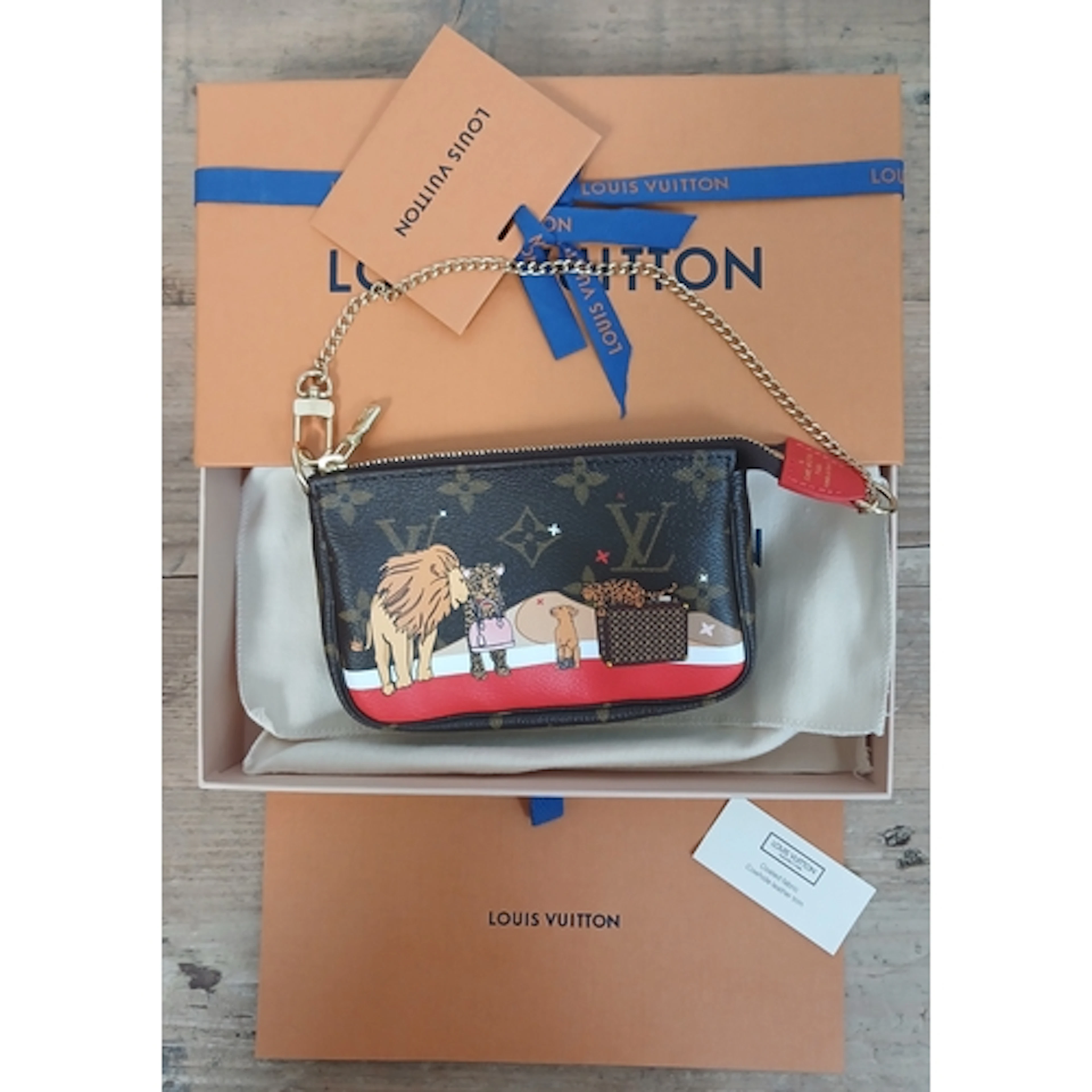 LOUIS VUITTON, limited edition Christmas 2018 moonogram poch...
