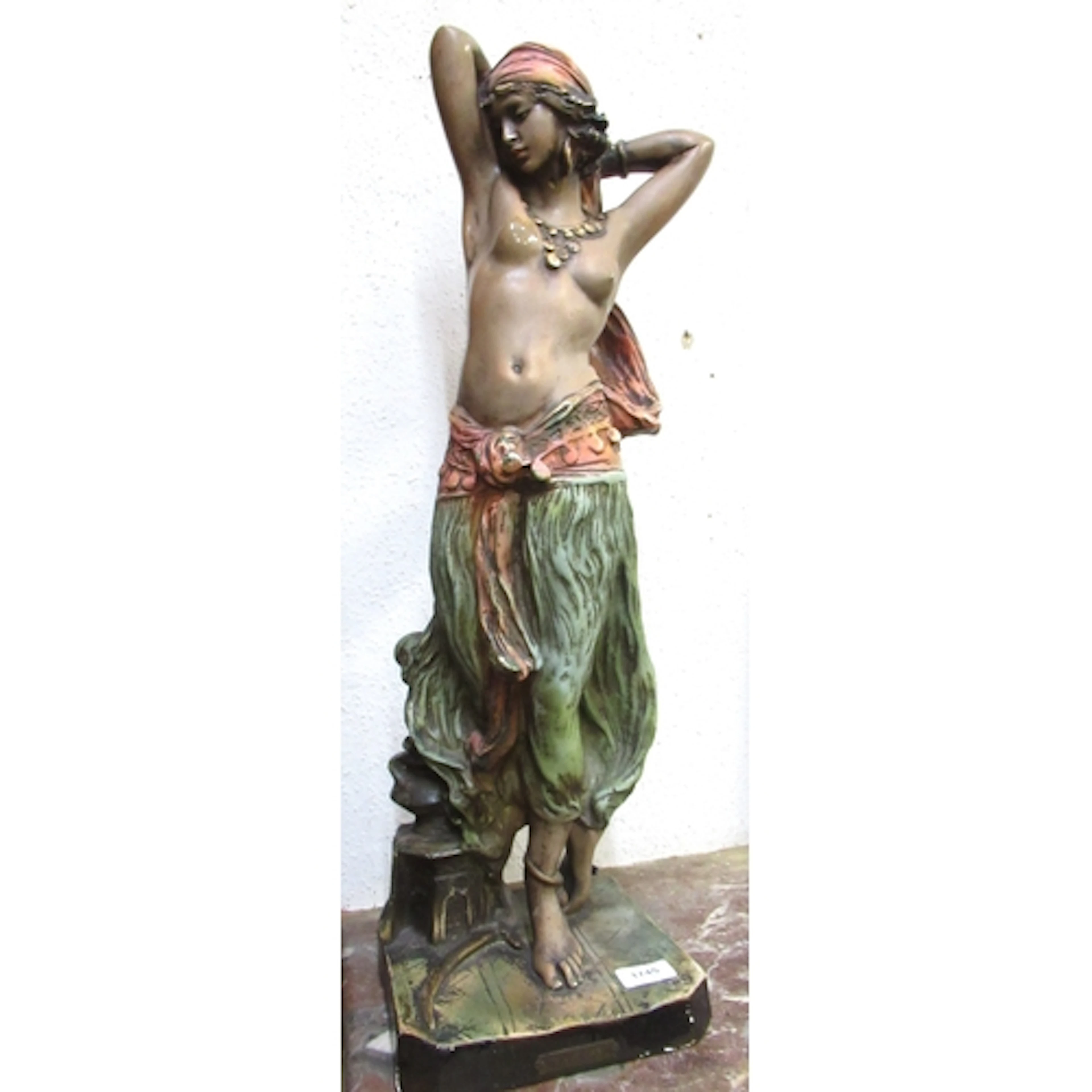 Painted plaster figure of a North African dancing girl, 68cm...