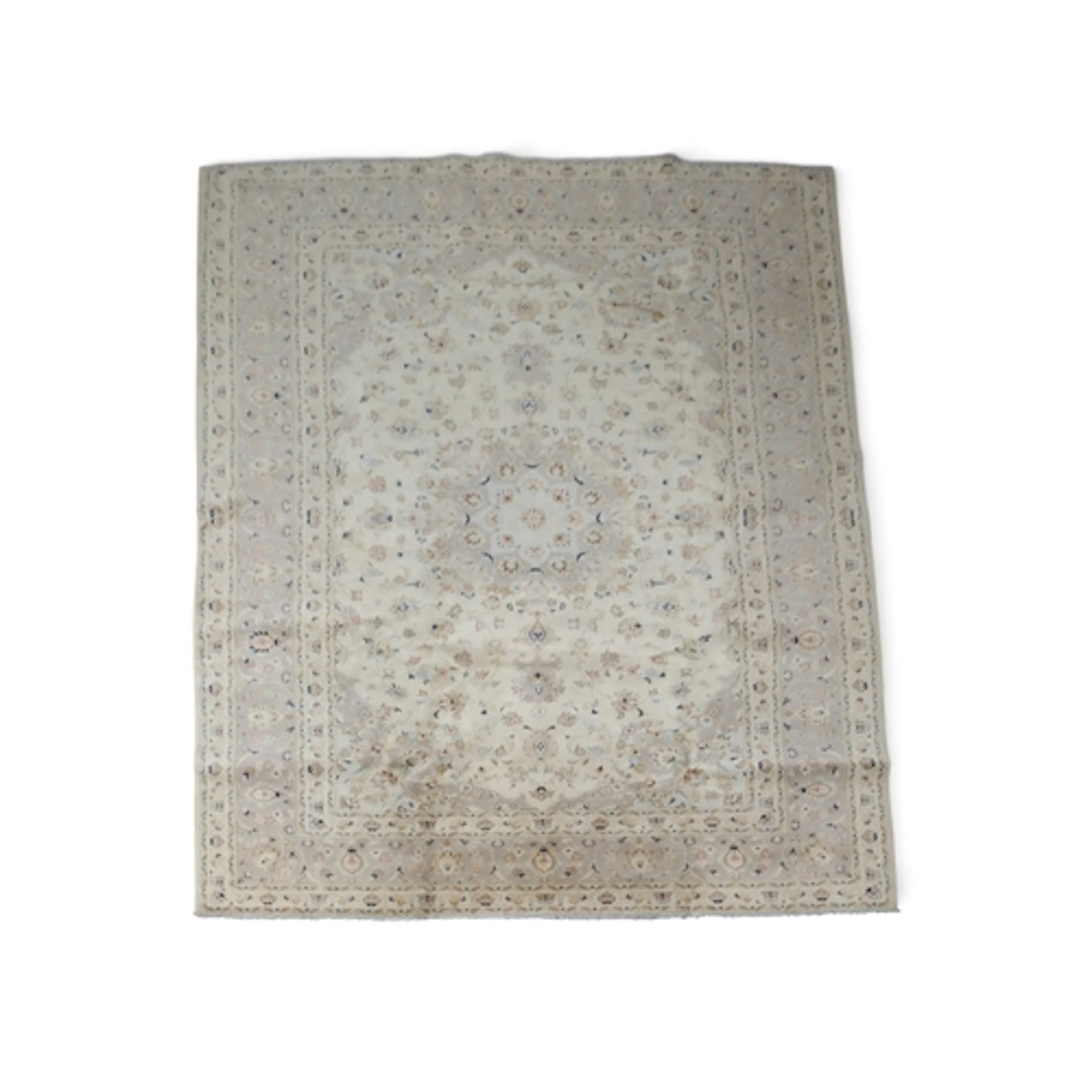 A CREAM GROUND FINE PILE KASHAN RUG with beige sunburst cent...