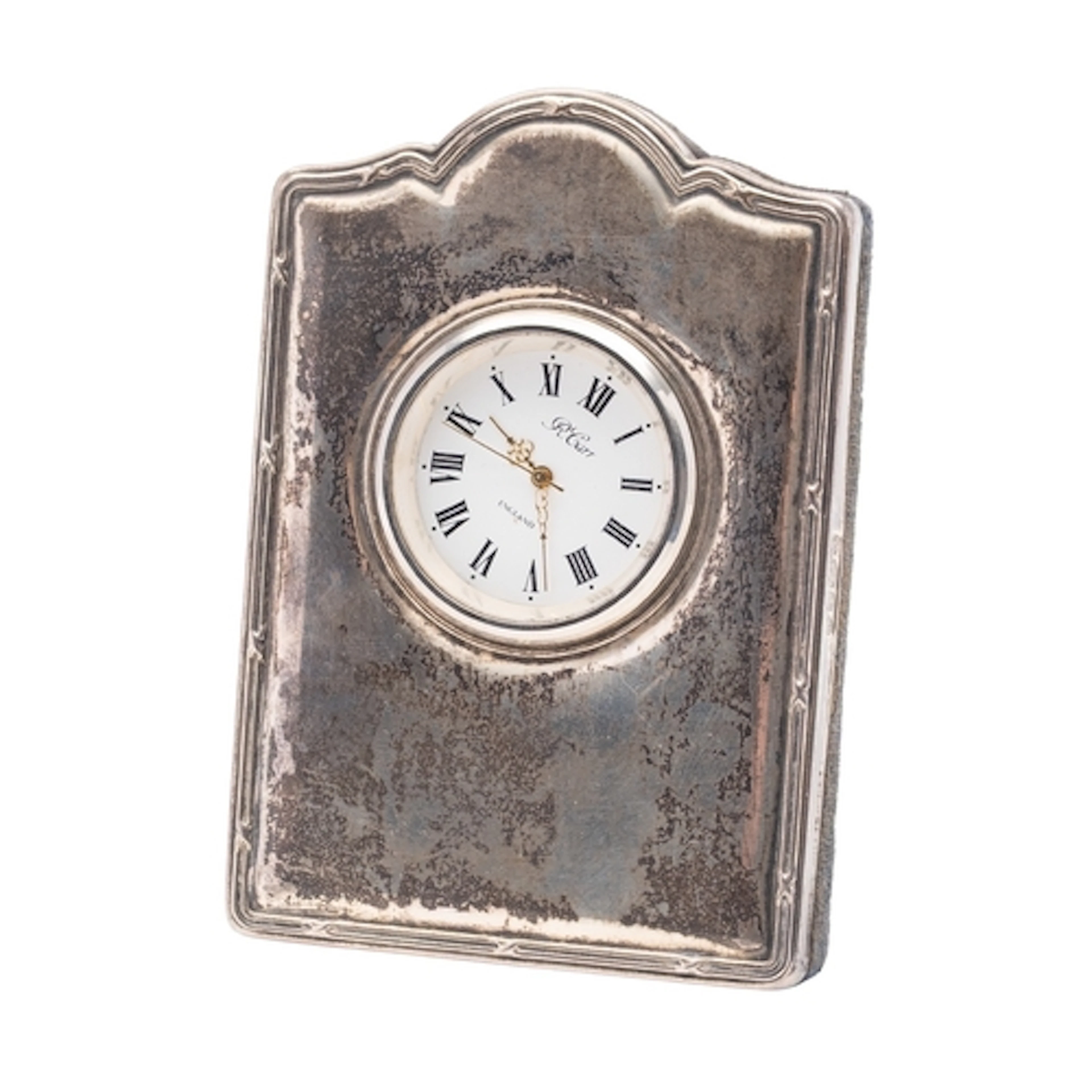R. Carr, England, a silver easel clock, the round white enam...