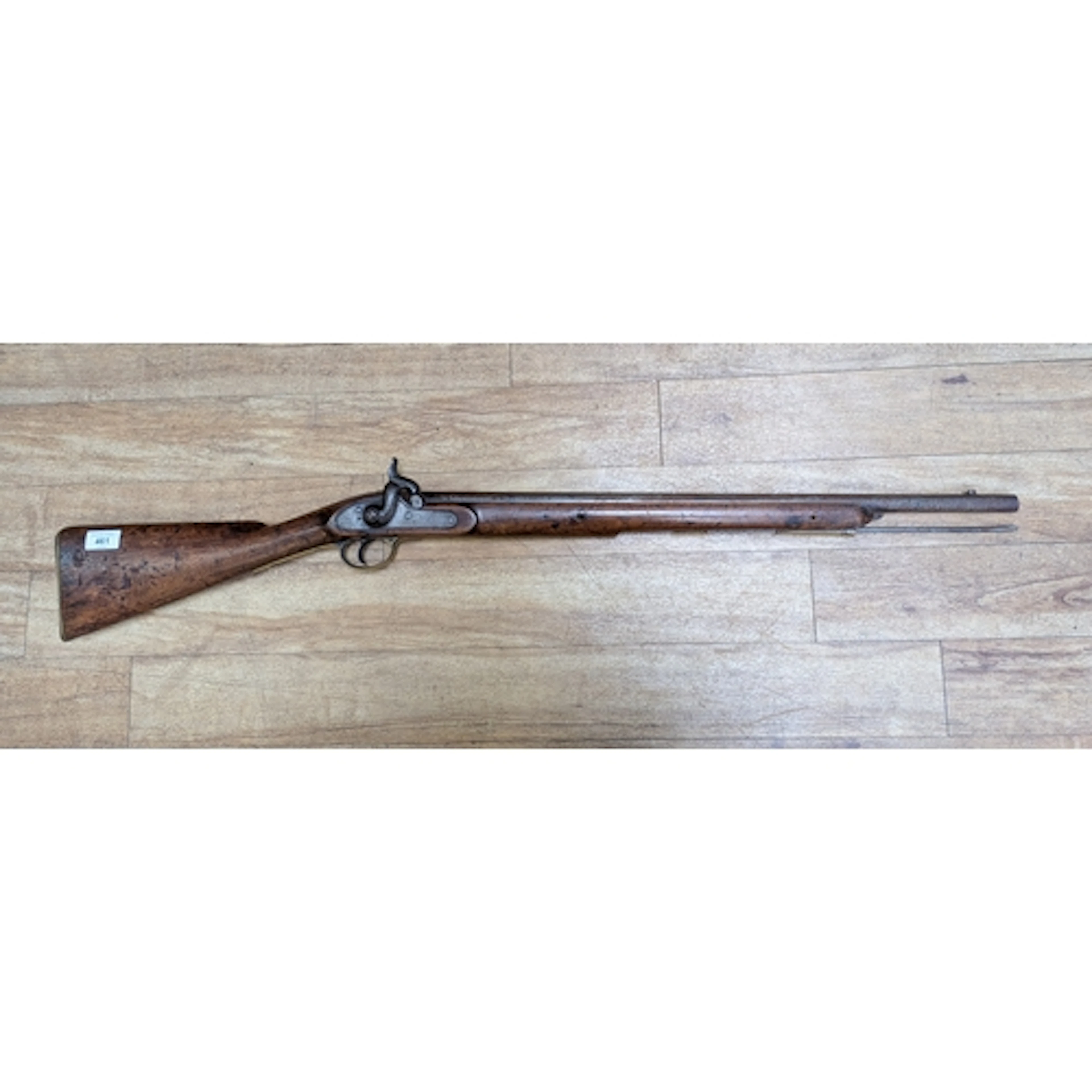 An antique hammer action wall piece musket, marked Tower