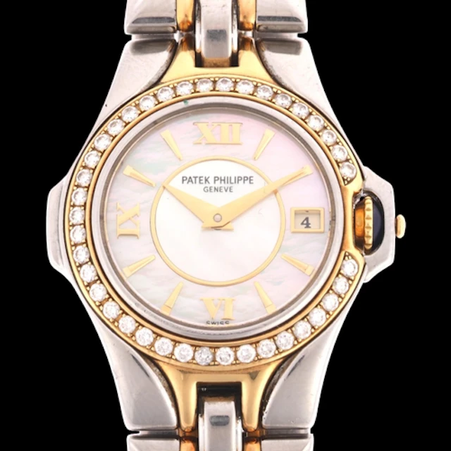 PATEK PHILIPPE - a lady's bi-metal diamond Sculpture quartz ...