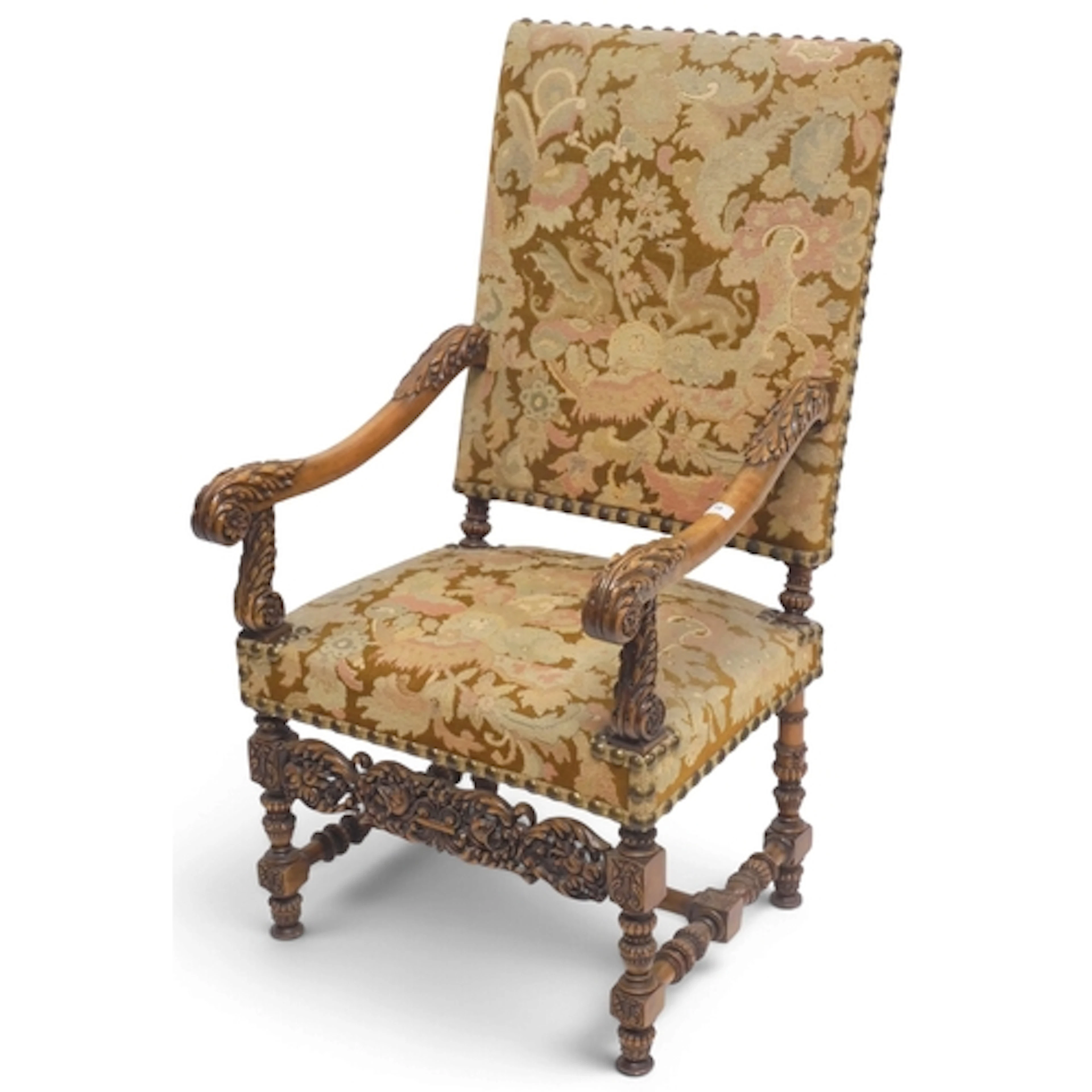 A 19th century walnut framed armchair with floral upholstere...