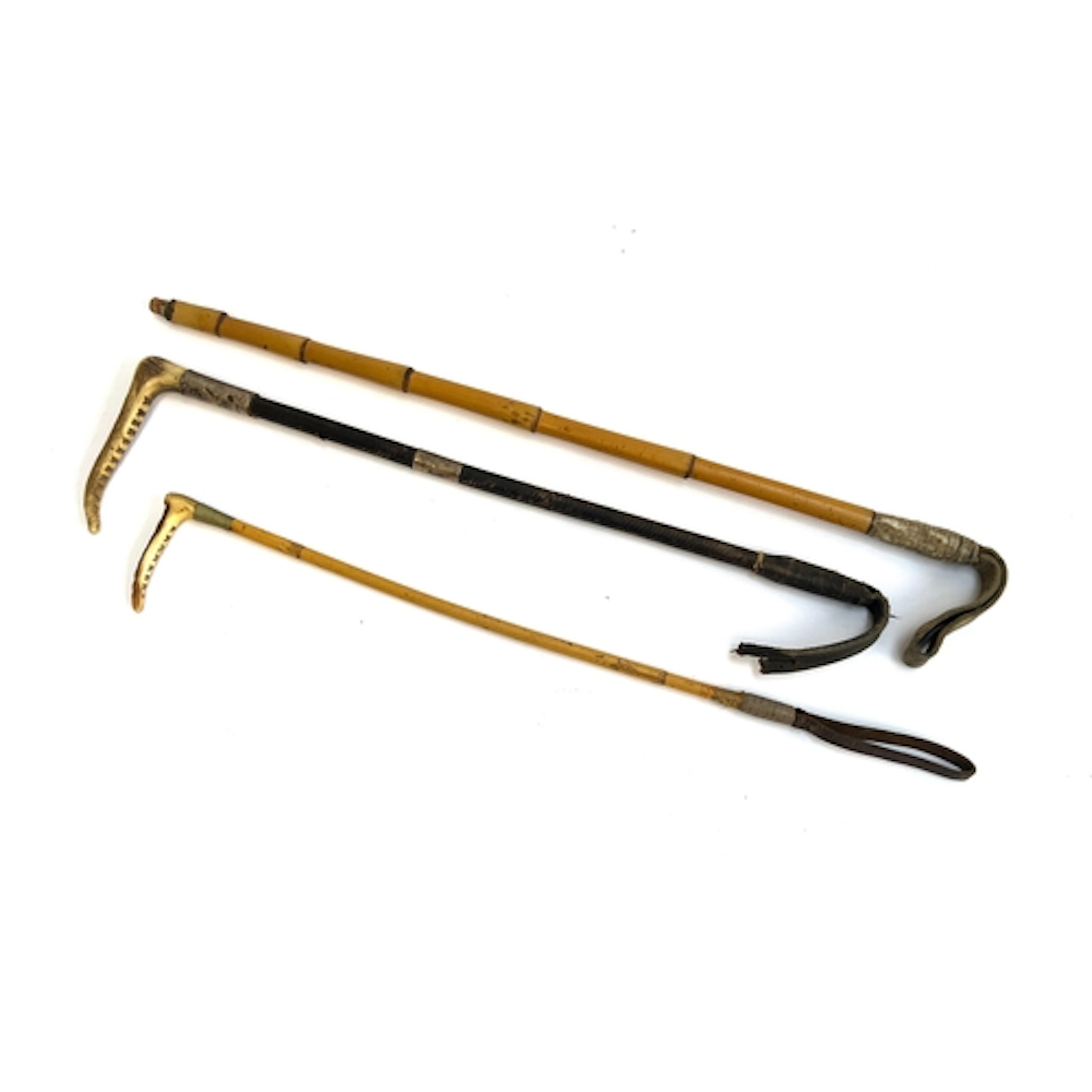 A ladies' hunting whip with silver collars (one Birmingham 1...