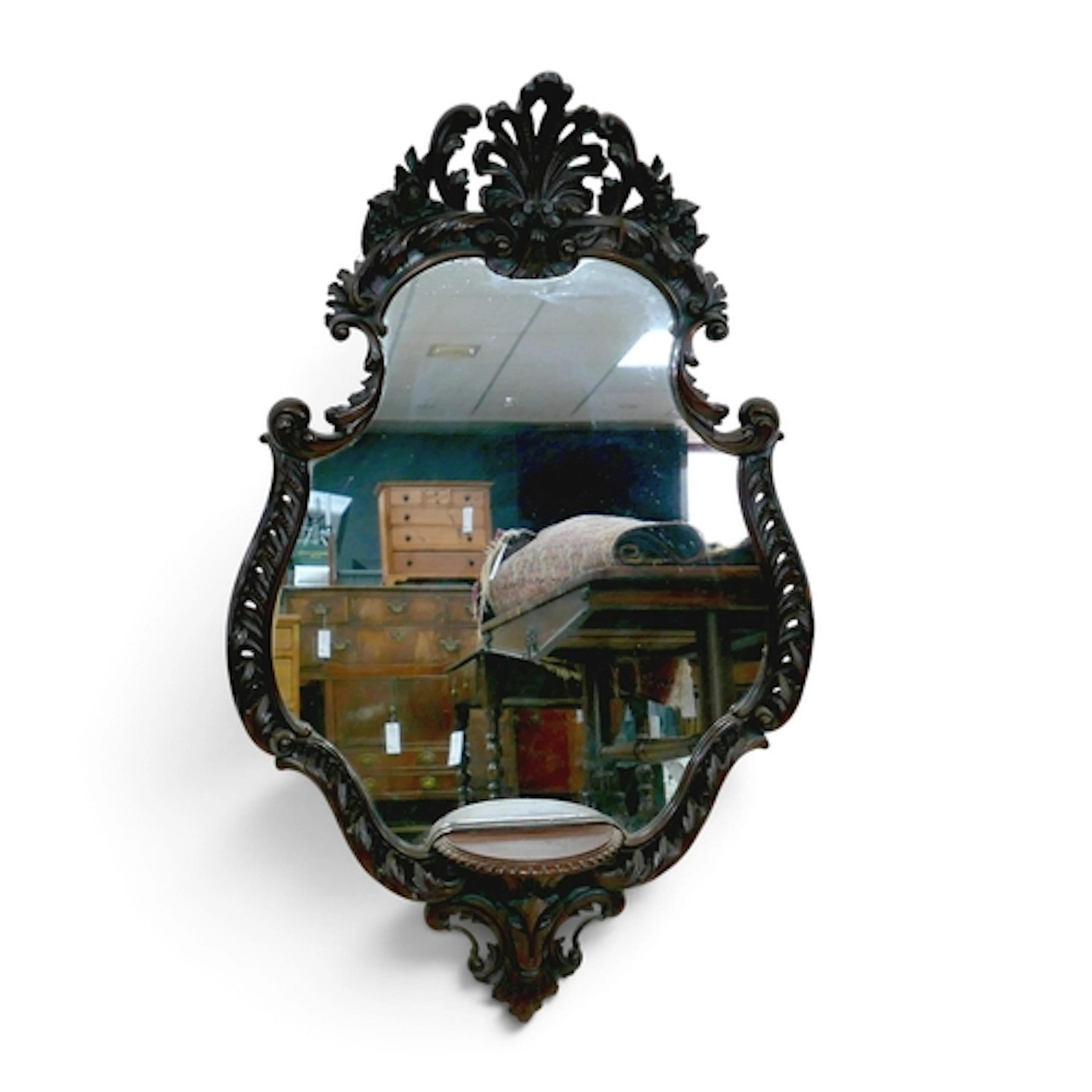 A 19TH CENTURY WALL MIRROR. mahogany with carved scroll acan...