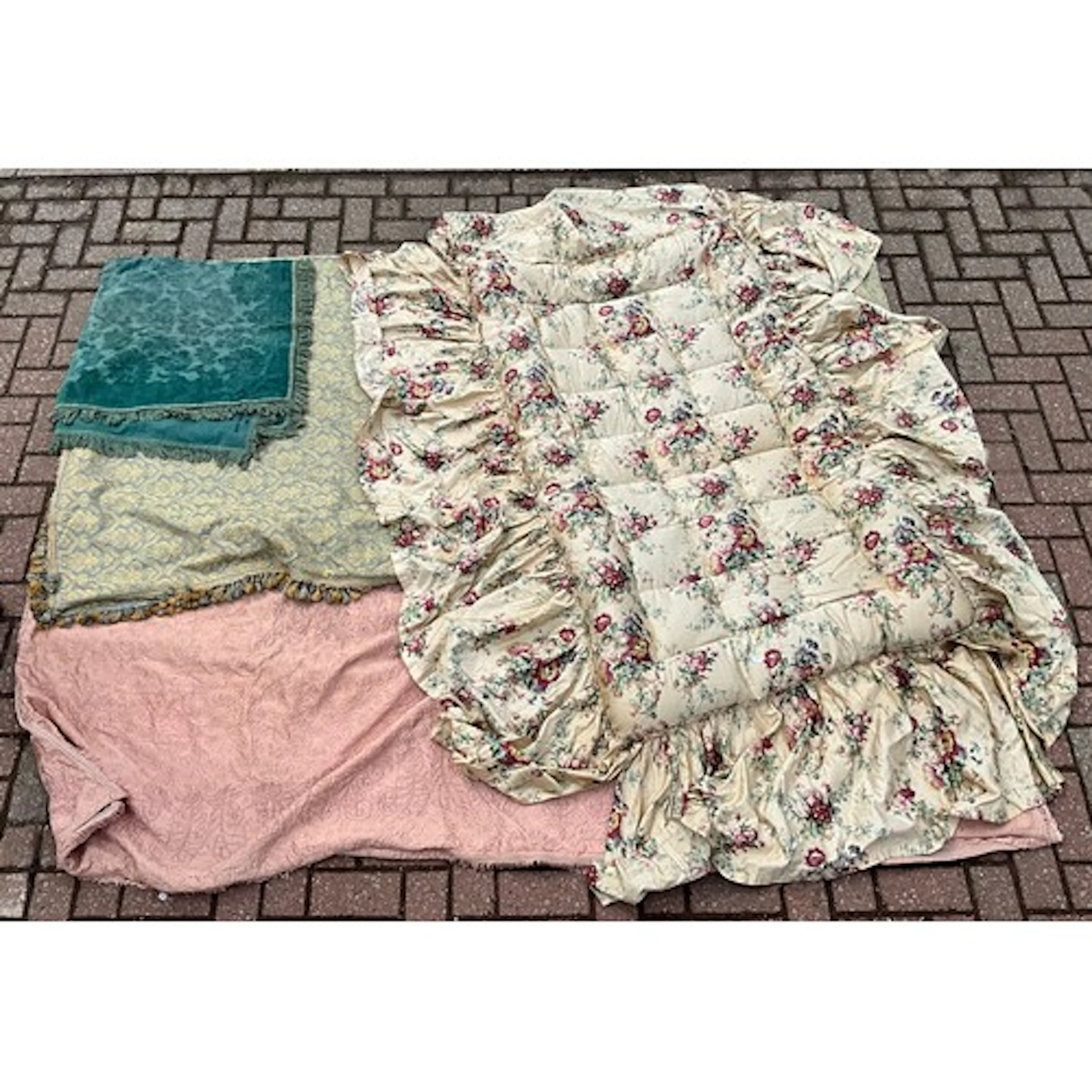 A single size eiderdown quilt, on floral printed material, g...
