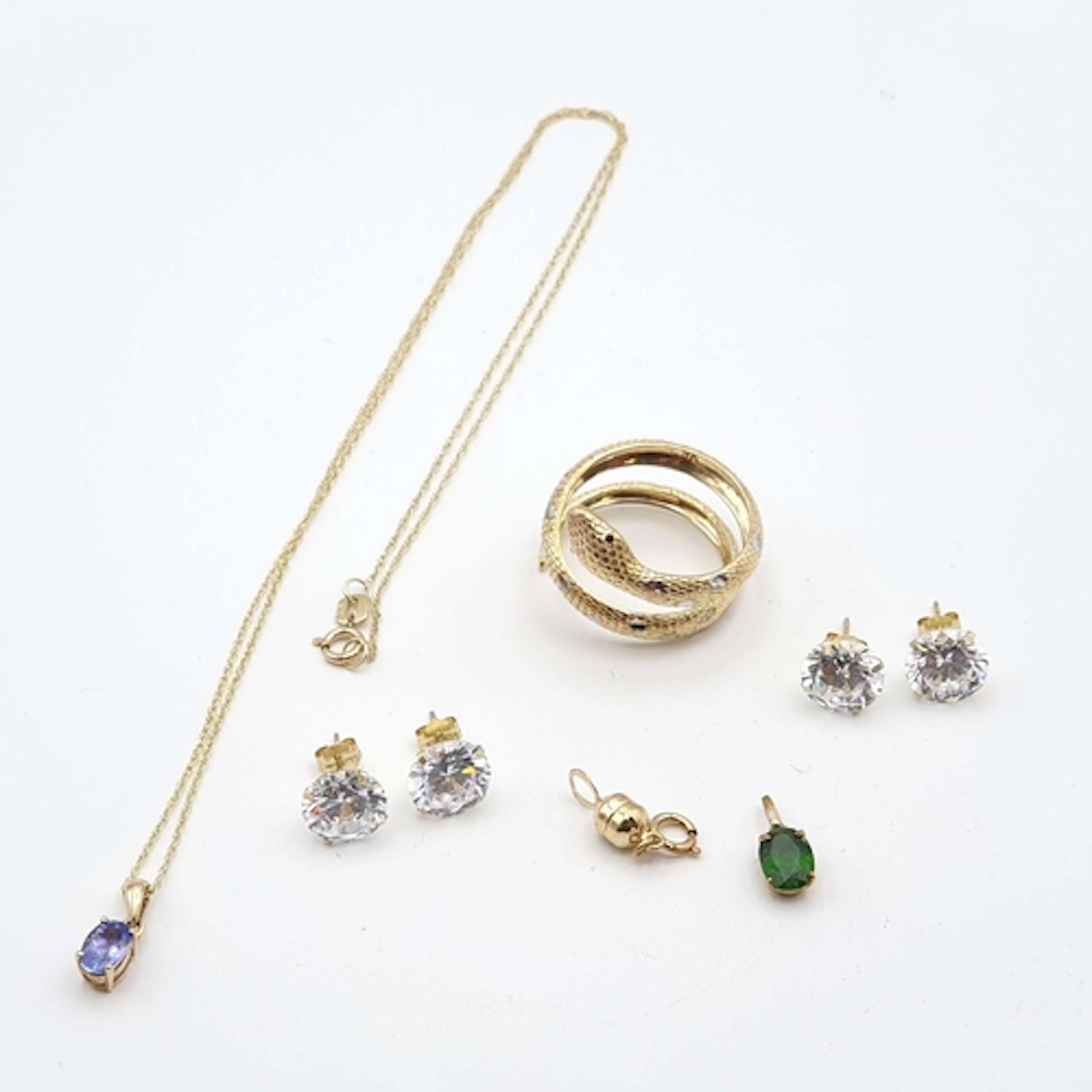 A 9ct gold Snake Ring, ring size O, a tsavorite garnet Penda...