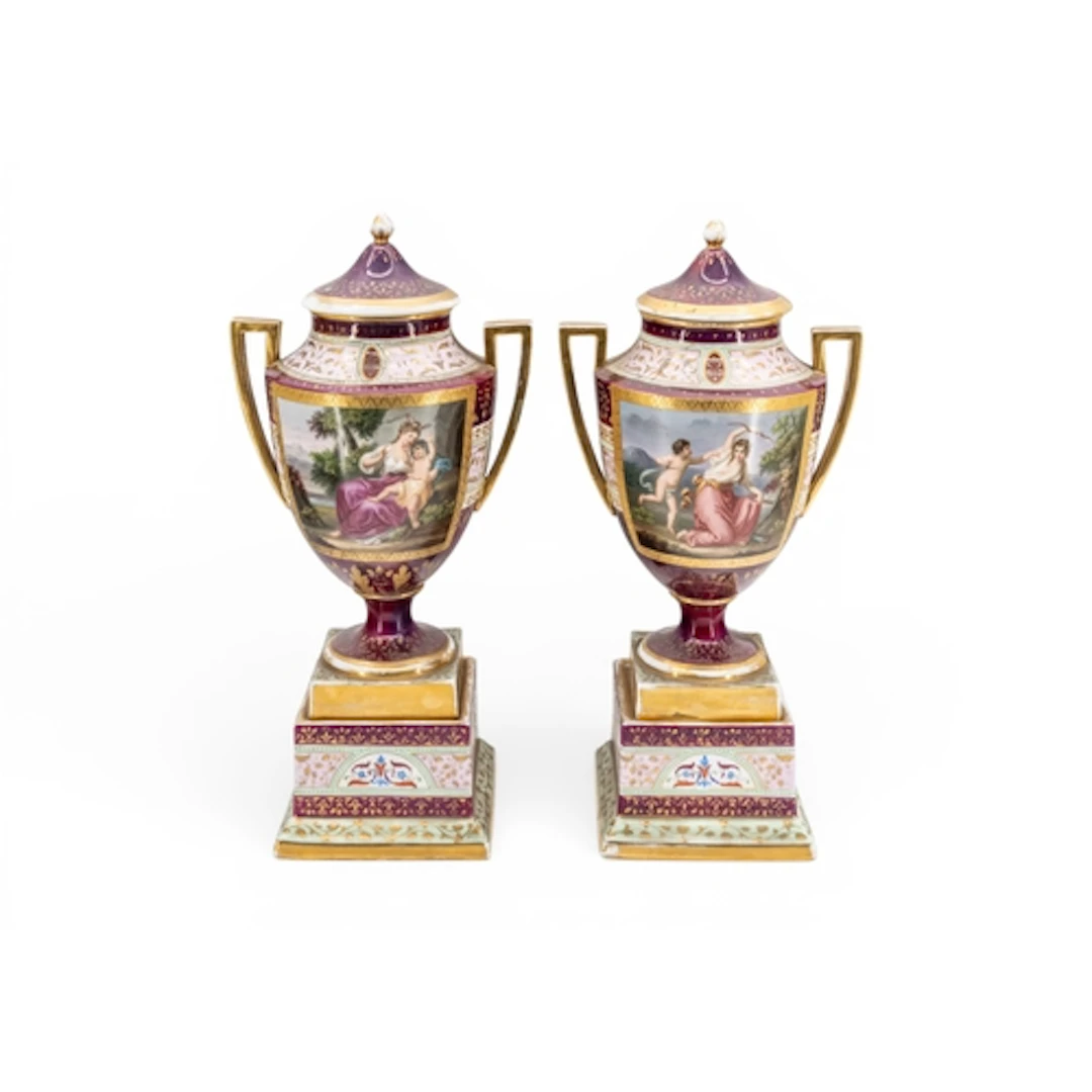 A PAIR OF VIENNA COVERED URN SHAPED VASES decorated with pan...