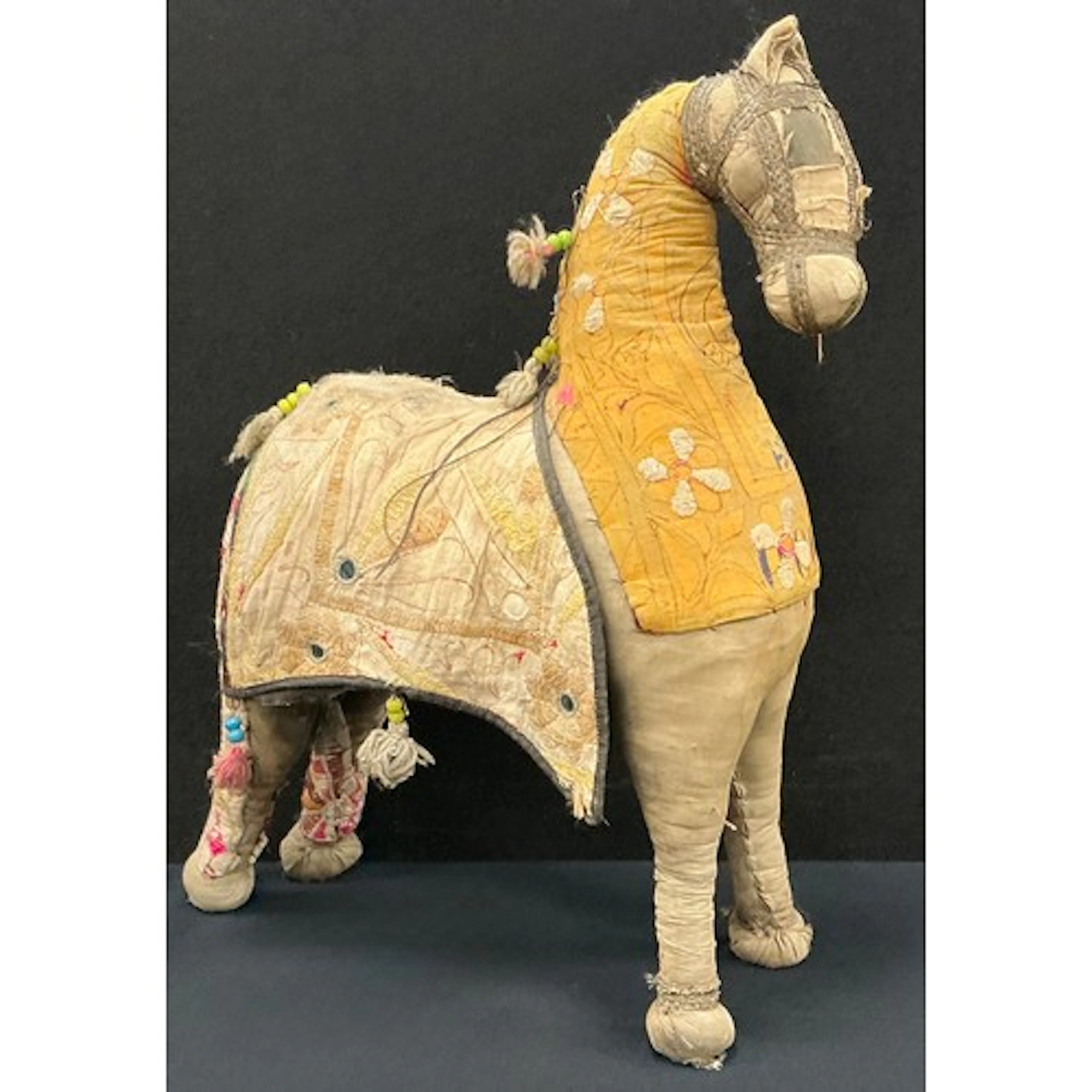 A middle eastern ceremonial fabric horse with embellished be...