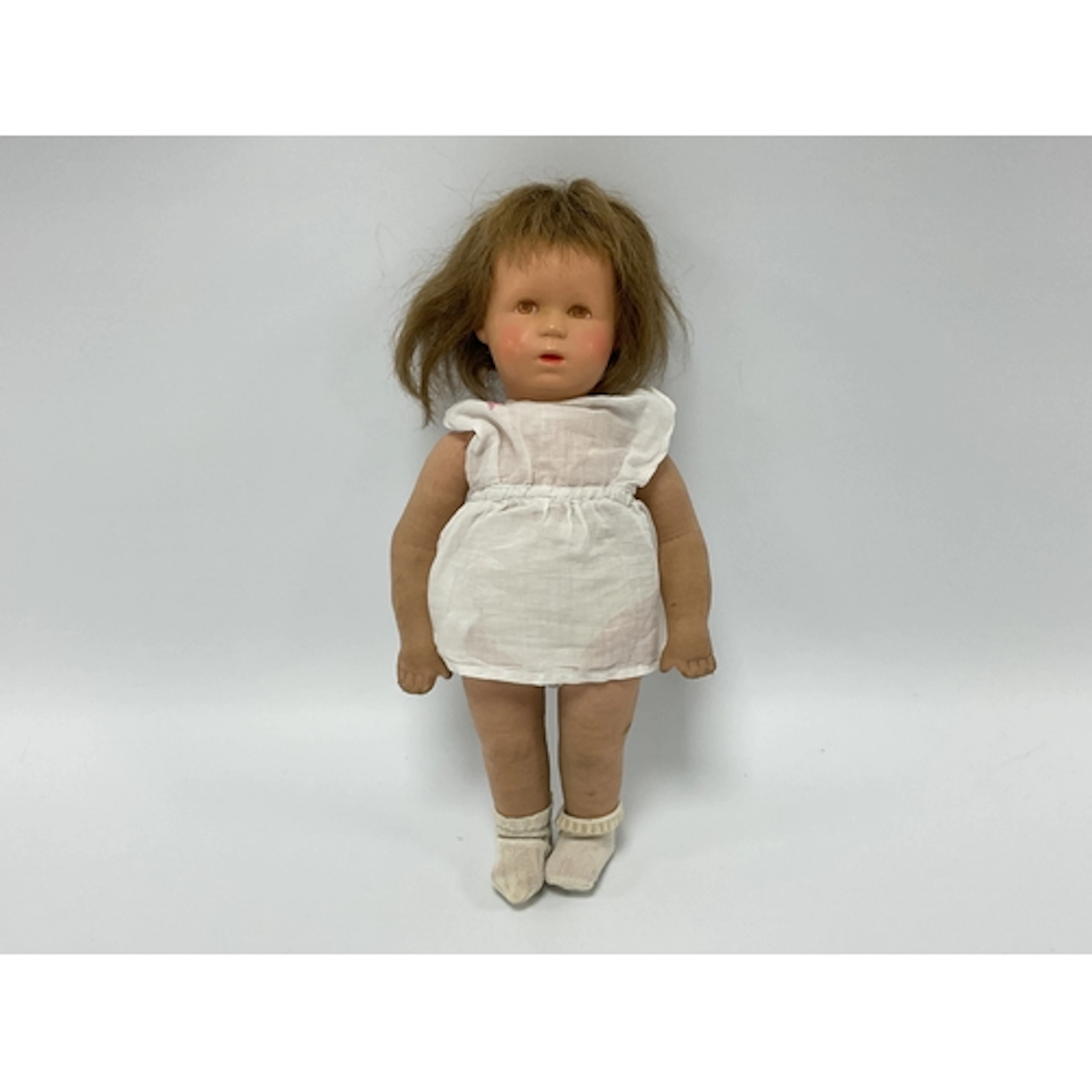 A Kathe Kruse Doll, with painted hard plastic swivel head, b...