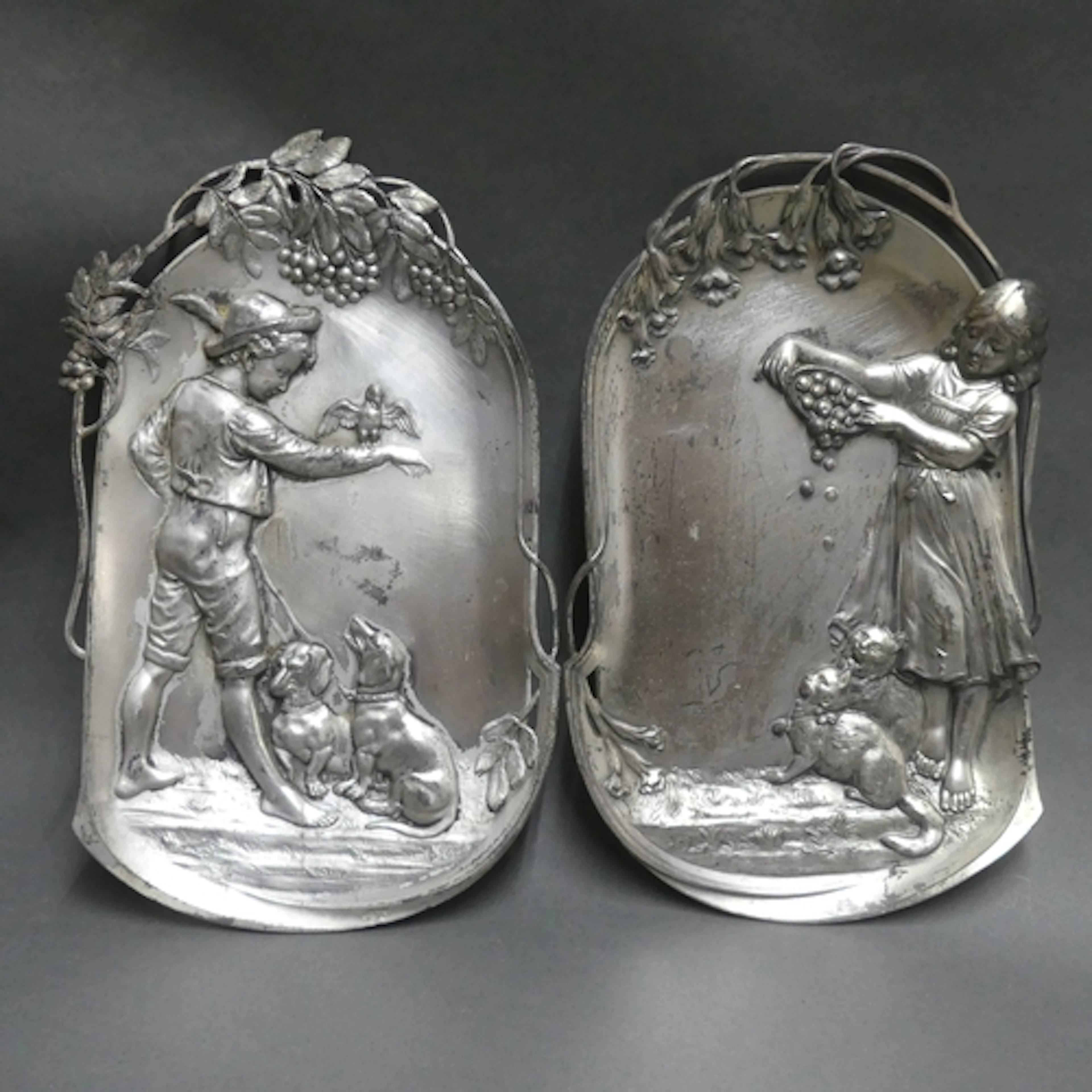 WMF - A pair of silver plated shallow trays or wall plaques,...