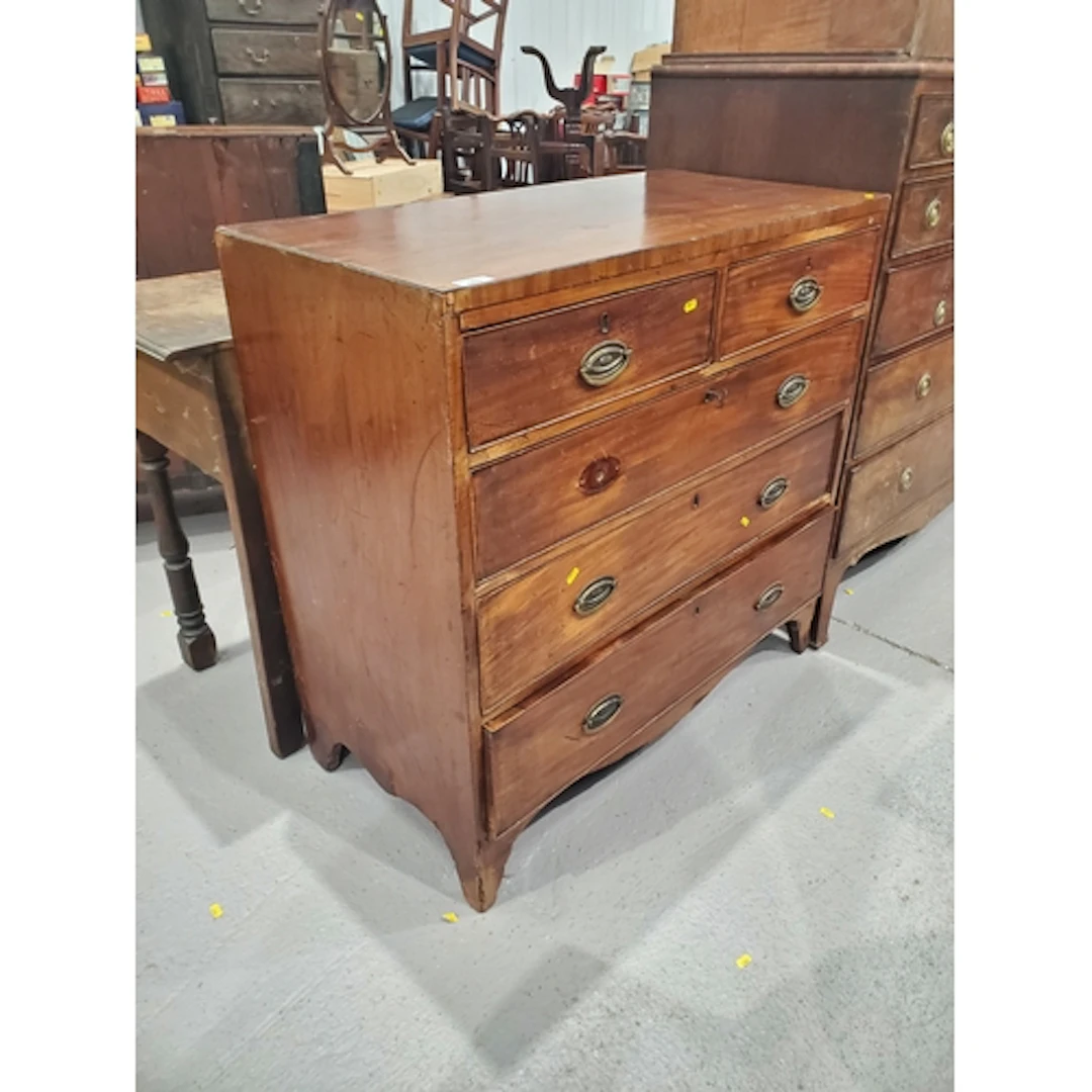 A mahogany Chest of Drawers fitted two short over three long...