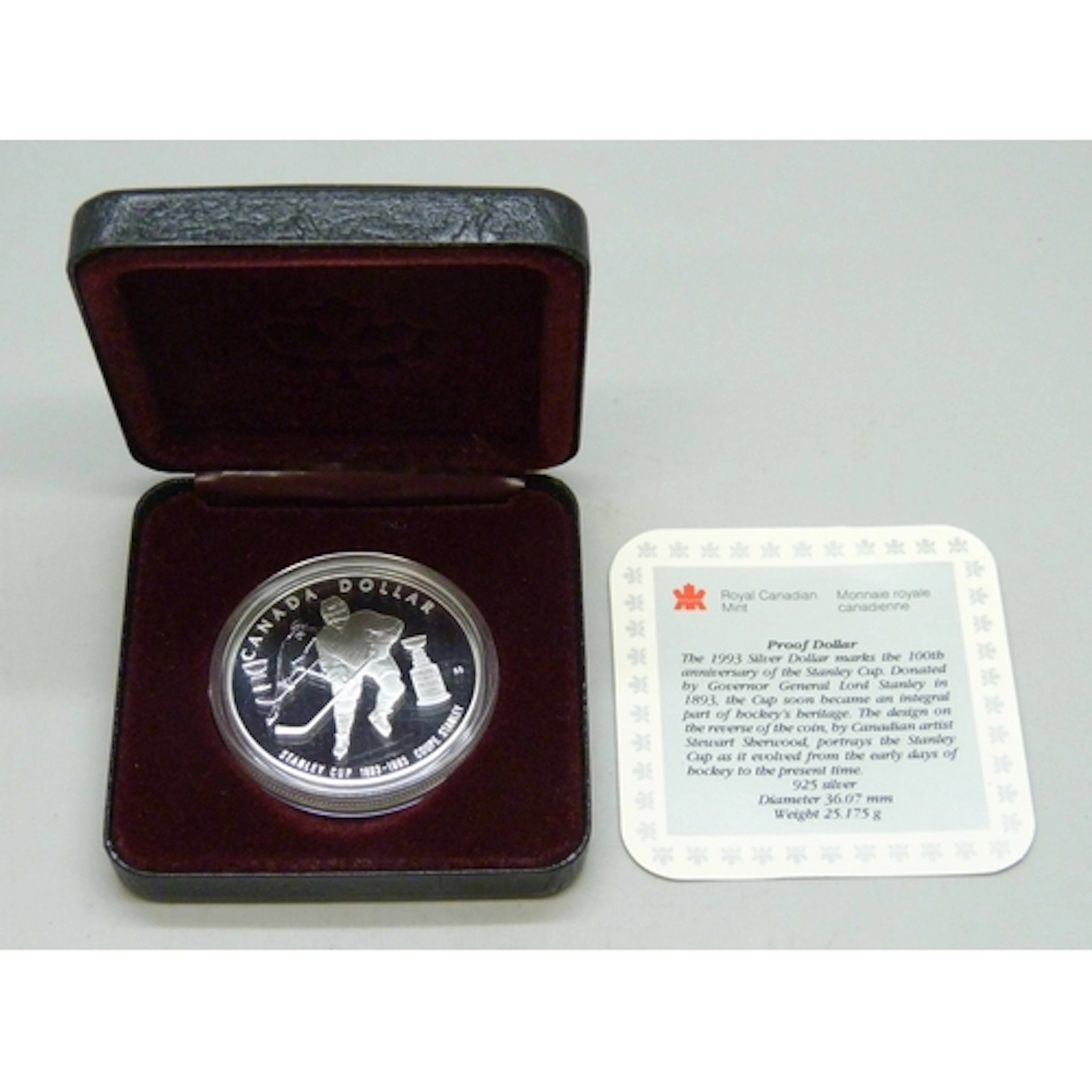 Coins - a 1993 silver proof Canadian dollar, Hockey, The Sta...