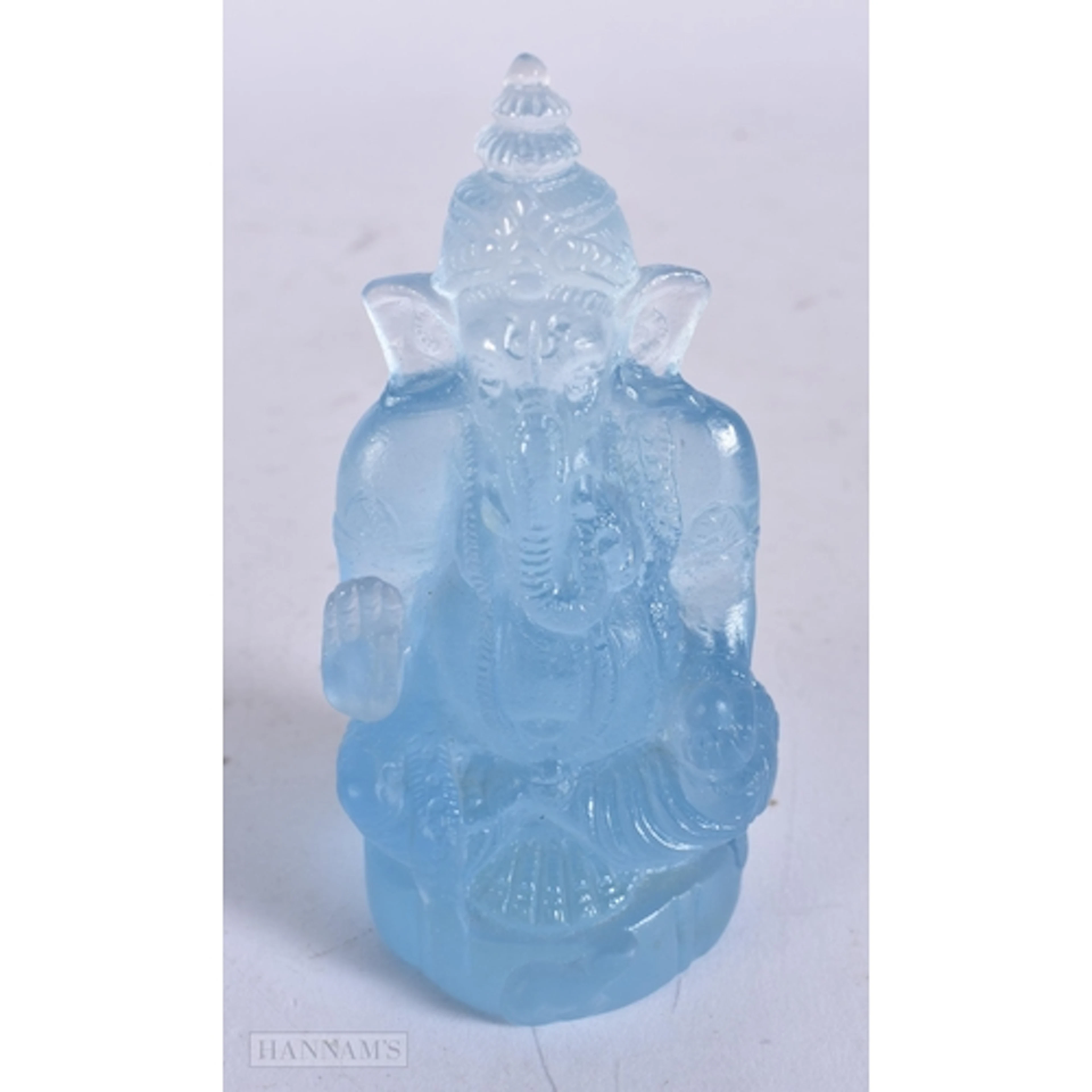 A BOXED DAUM BLUE GLASS GANESHA FIGURE. 9.25 cm high.