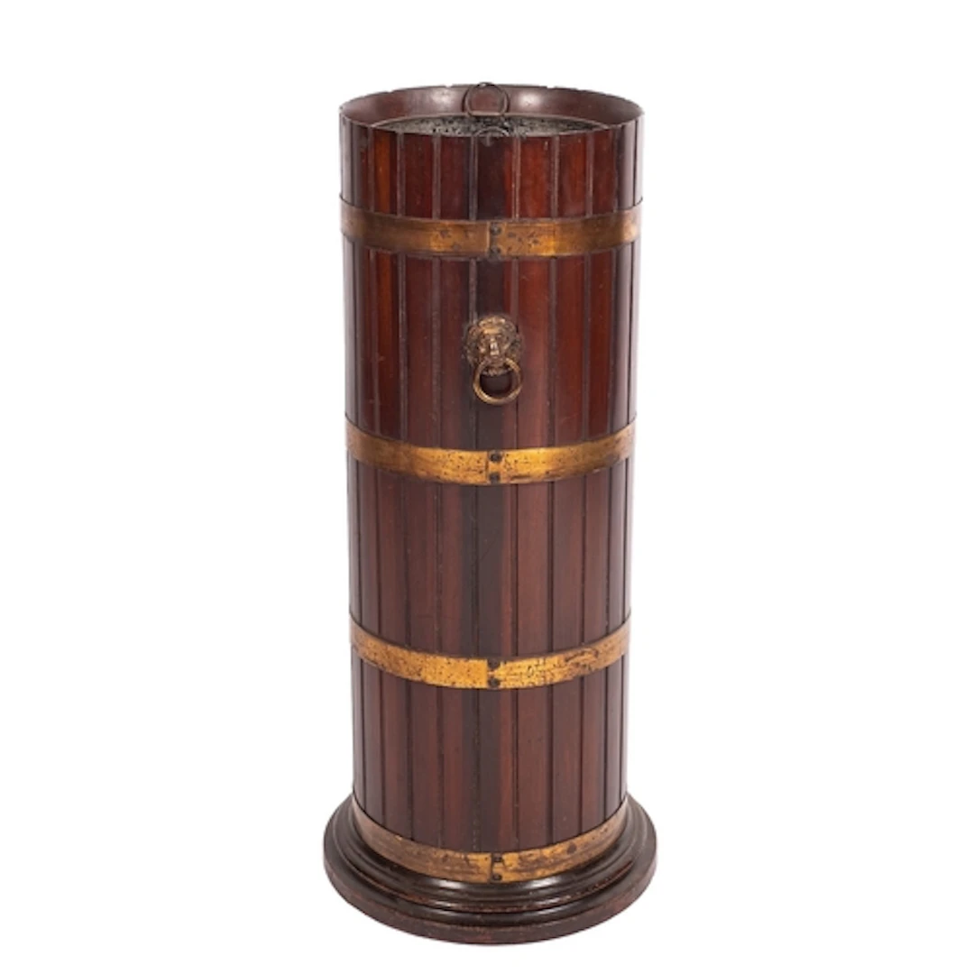 A mahogany and gilt brass banded club or country house stick...